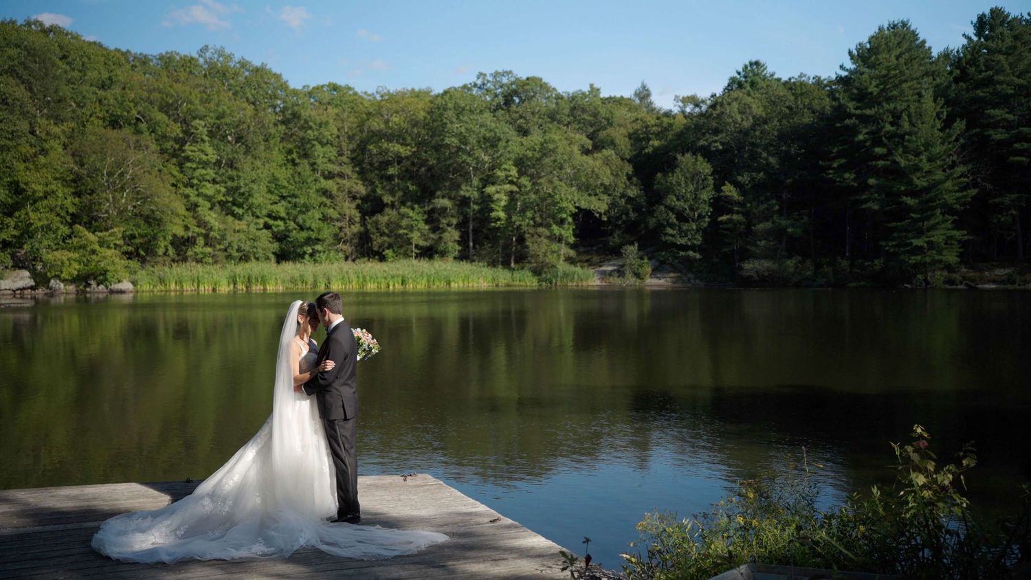 Couple portraits at the lake at Arrow Park