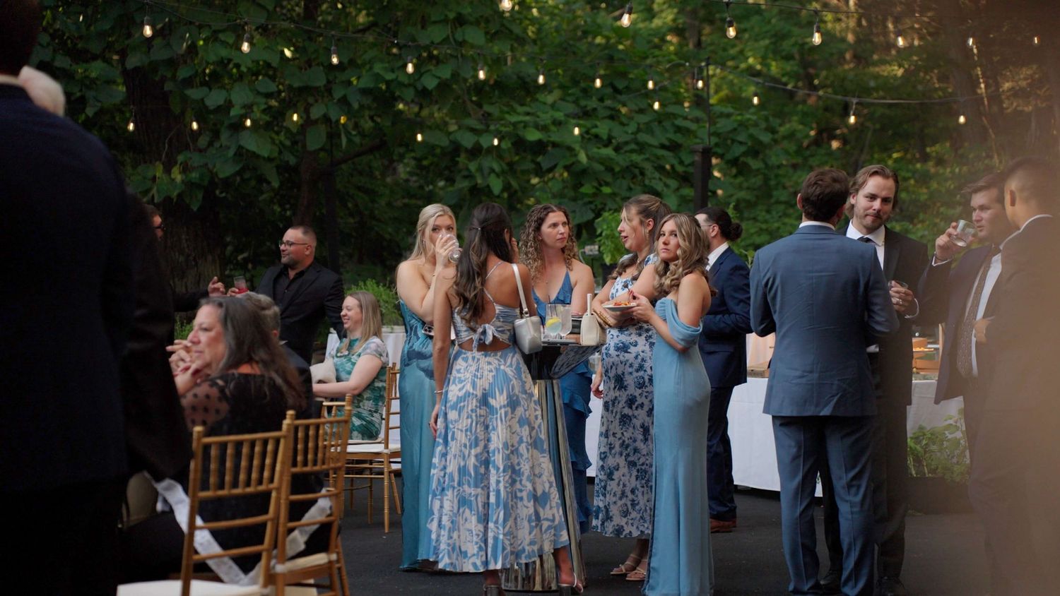 Guests enjoying cocktail our in Arrow Park courtyard