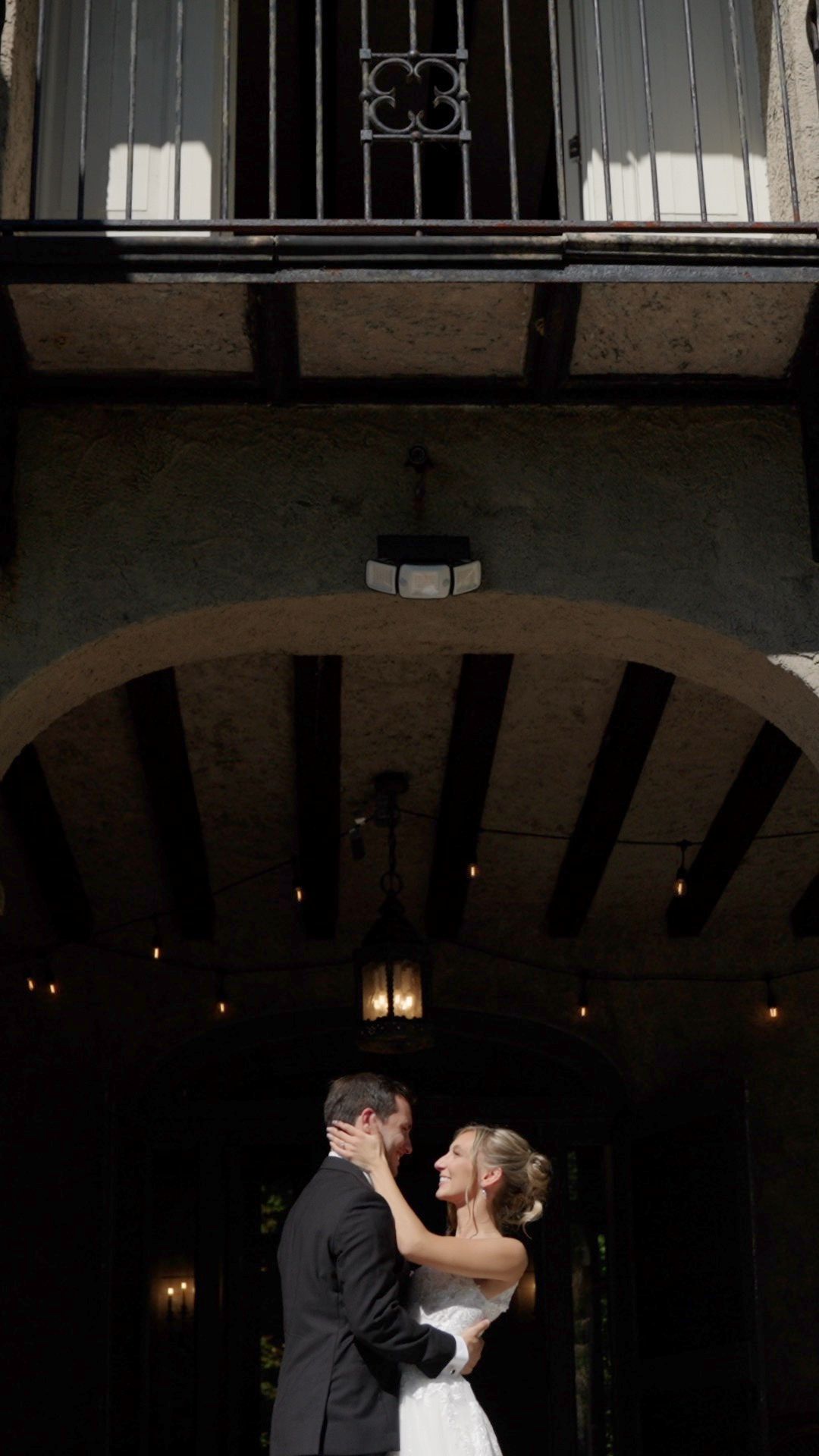 Bride and groom sharing their first look outside the historic Arrow Park mansion.