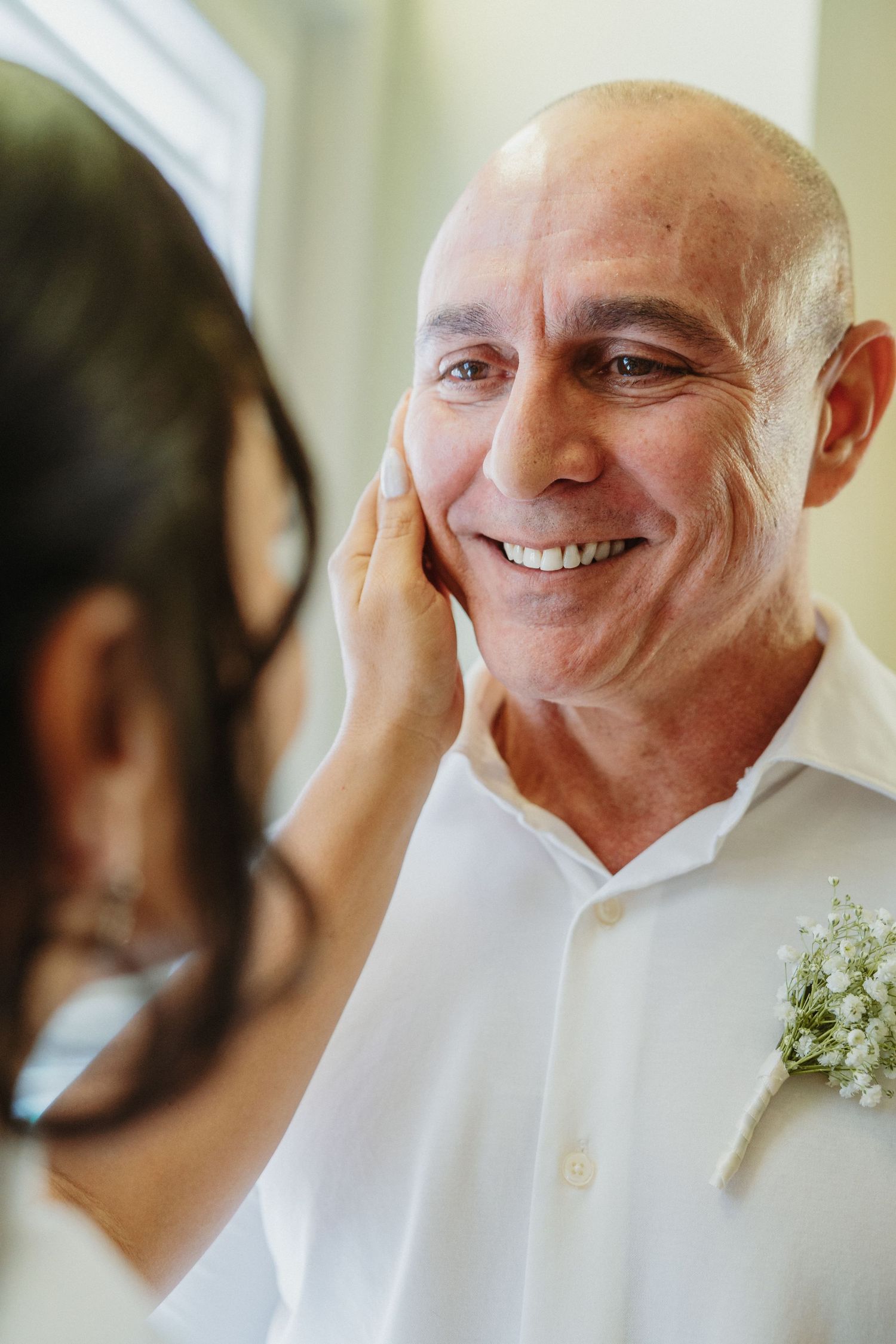 A series of candid emotional moments showing expressions of joy and laughter in a white dress shirt.