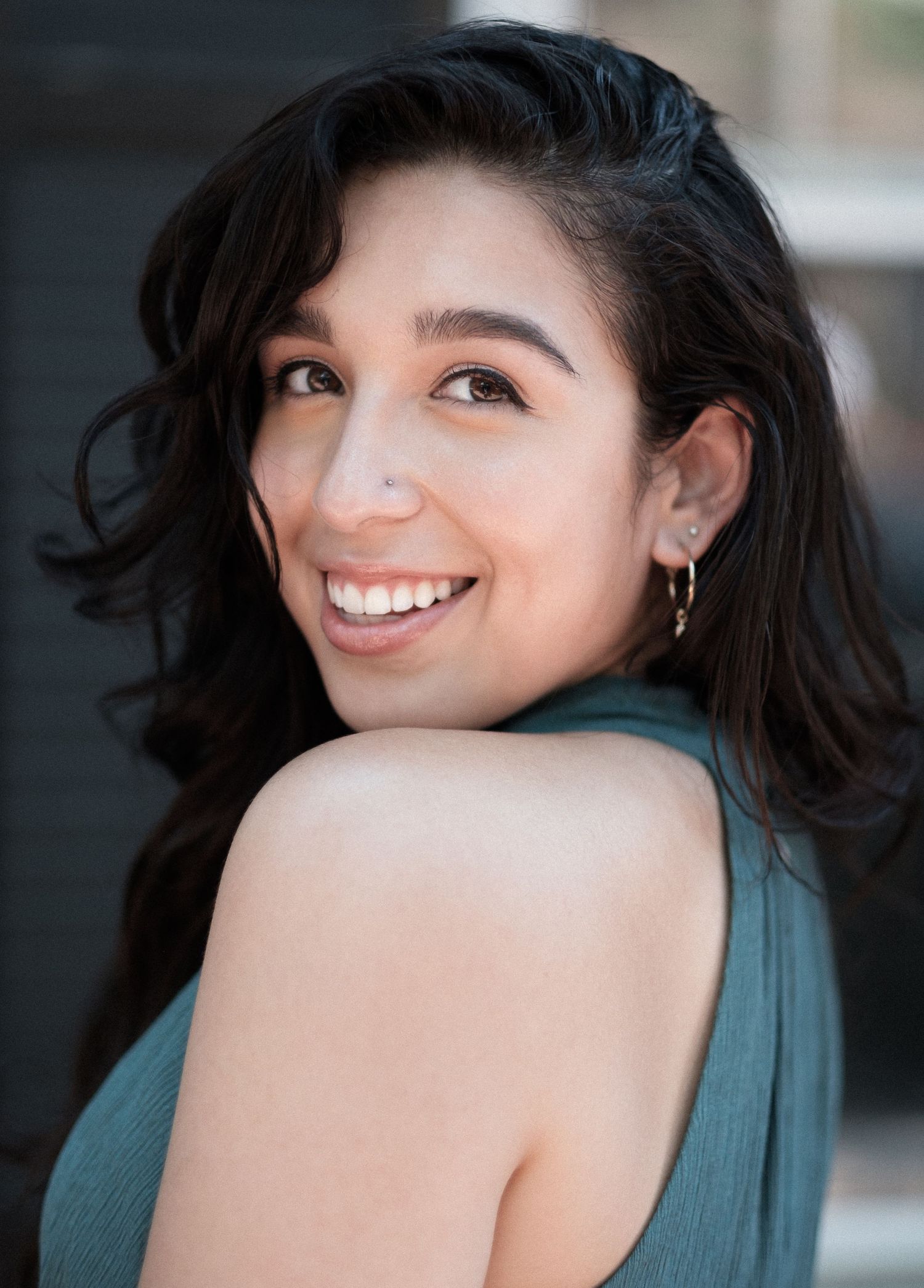 A series of expressive portrait shots showing a woman in a teal top against a blurred background.