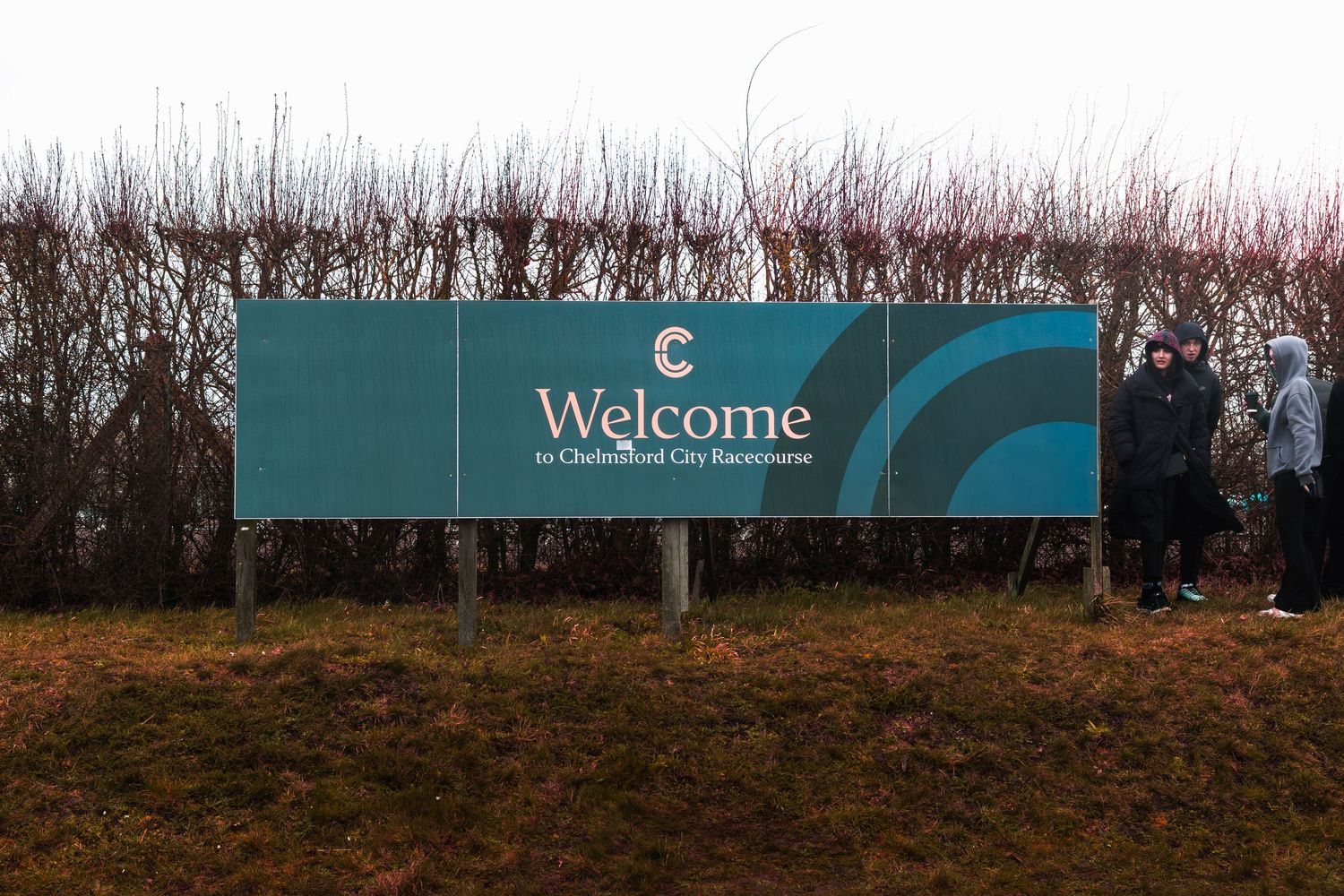 Welcome to Chelmsford City Racecourse sign at the entrance of the venue.