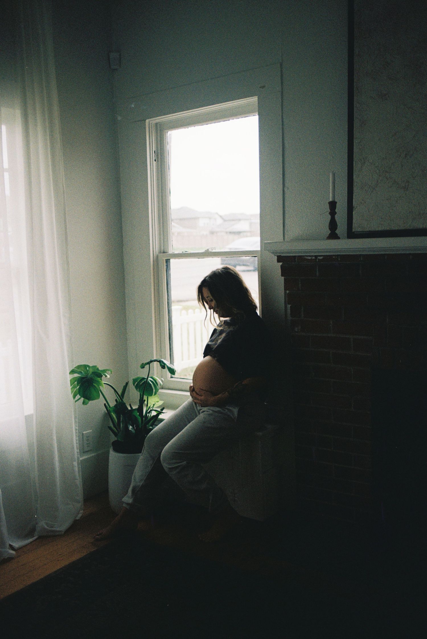 Moody sequence of dark interior shots with windows casting natural light into a minimalist room.