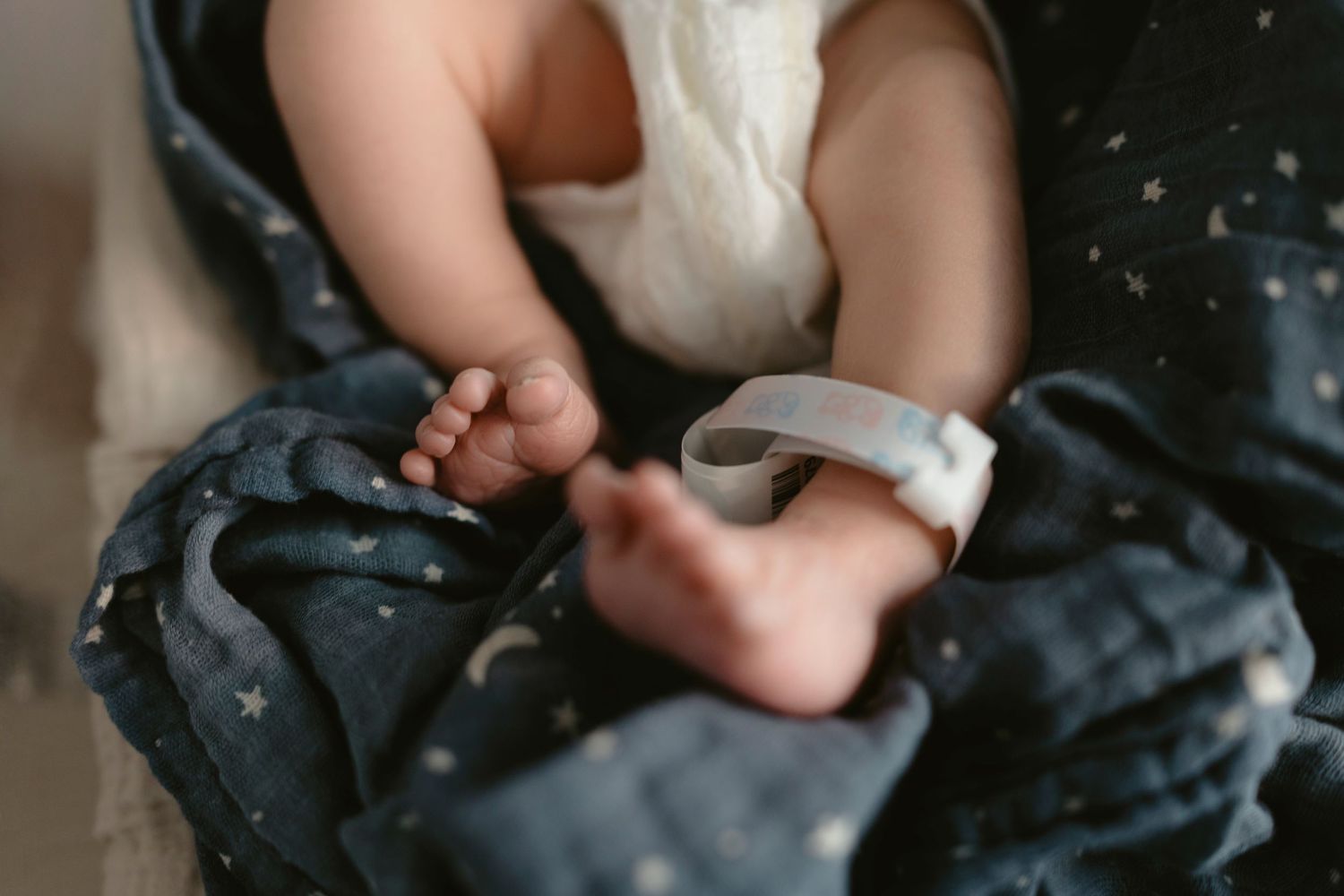 Close-up view of baby's feet.
