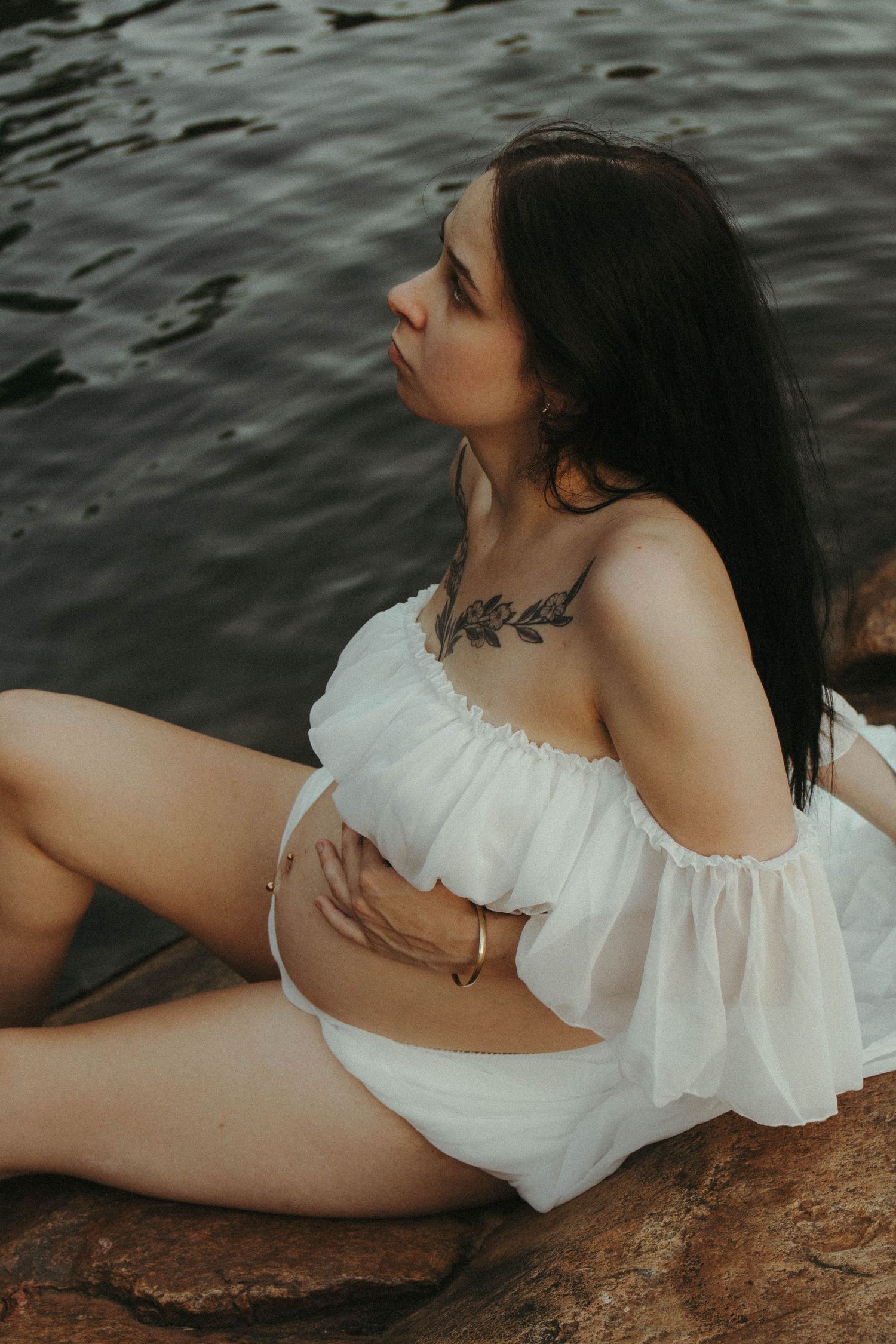 Pregnant woman gazing upward