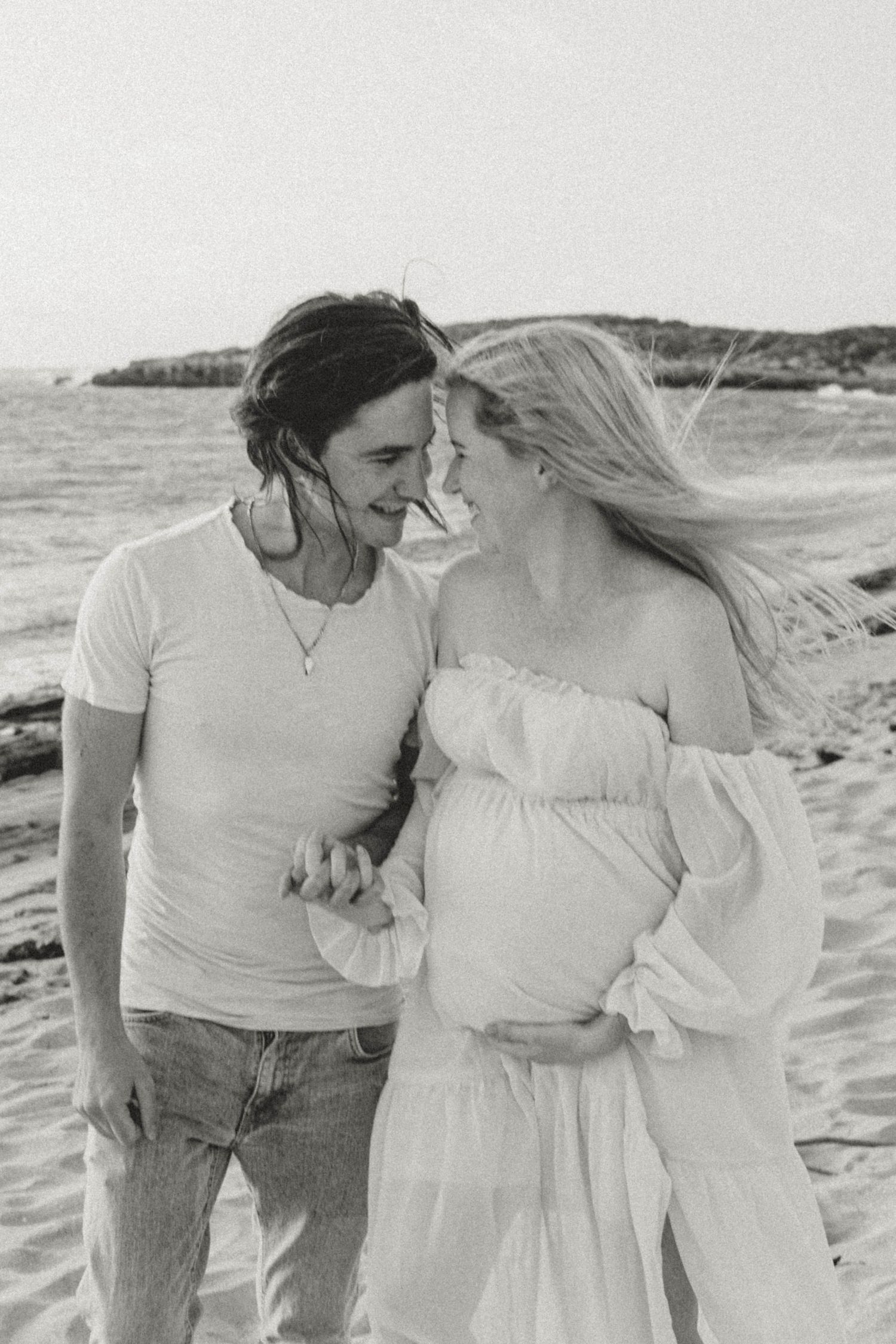 Black and white pregnant woman and partner