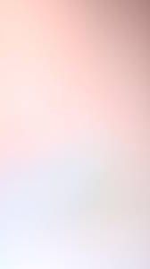 Pink gradient background with soft pastel hues blending from light to dark in an abstract pattern.
