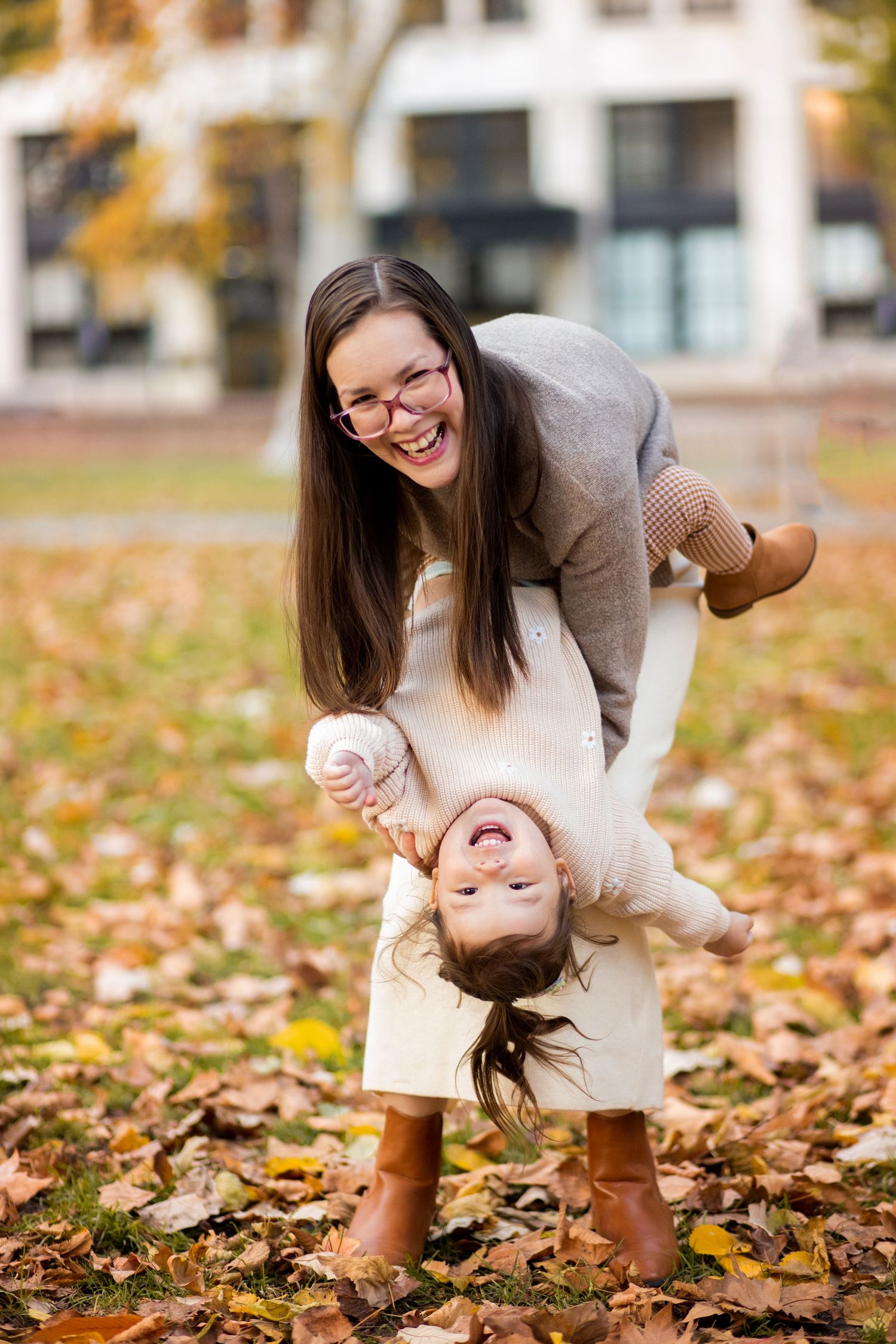 Four sequential photos showing a joyful autumn scene with fallen leaves on the ground and playful interactions captured in natural light.