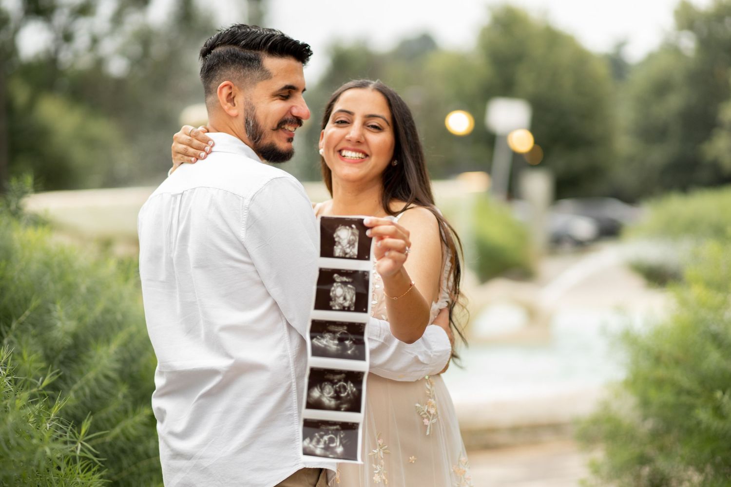 A series of outdoor photos showing pregnancy announcement moments with an ultrasound photo and embracing couple in nature settings.