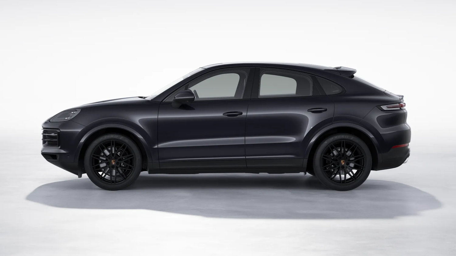 A sleek black Porsche Cayenne shown from multiple angles against a white background.