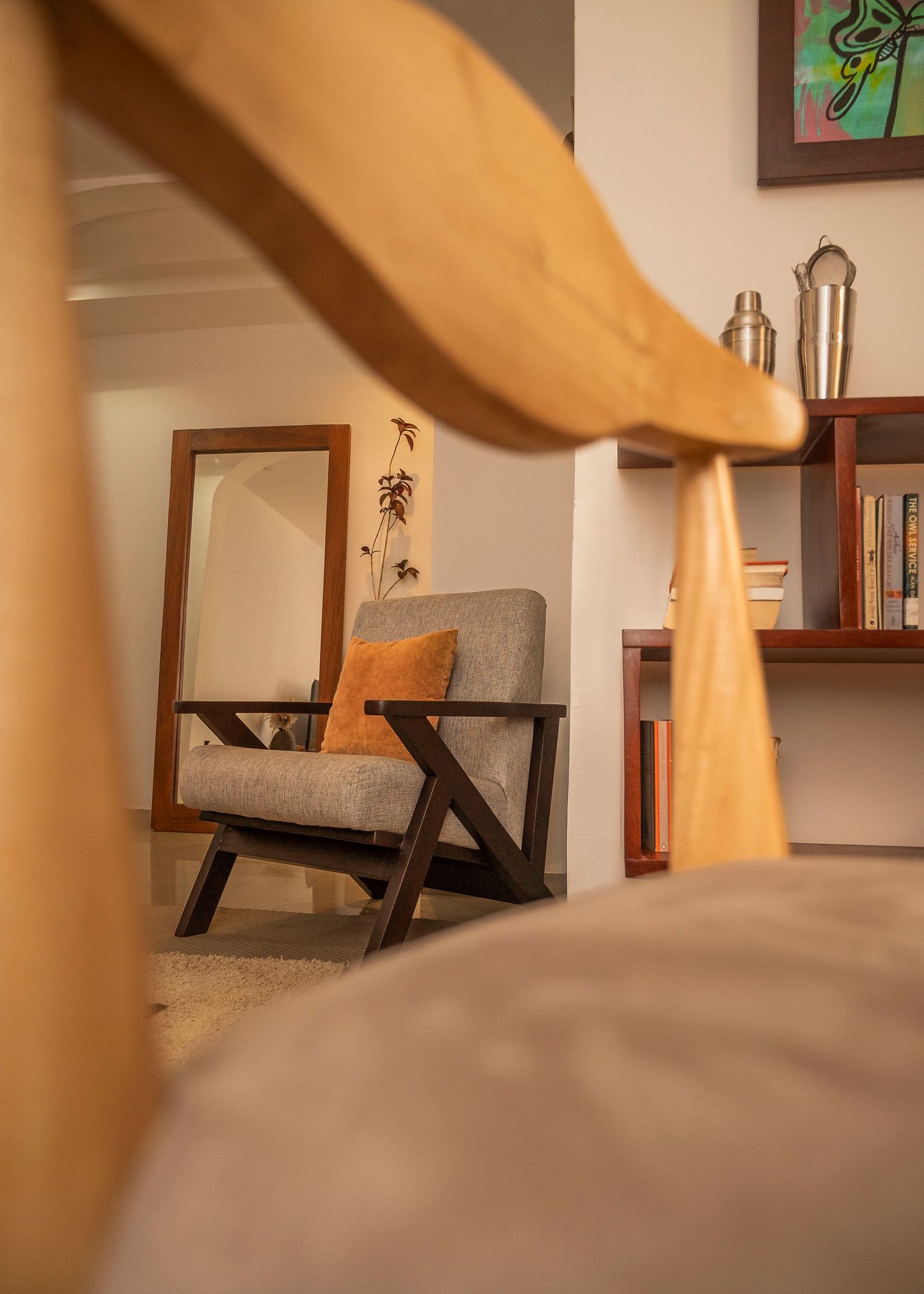 Low-angle view of modern furniture and decor in a cozy living room setting.