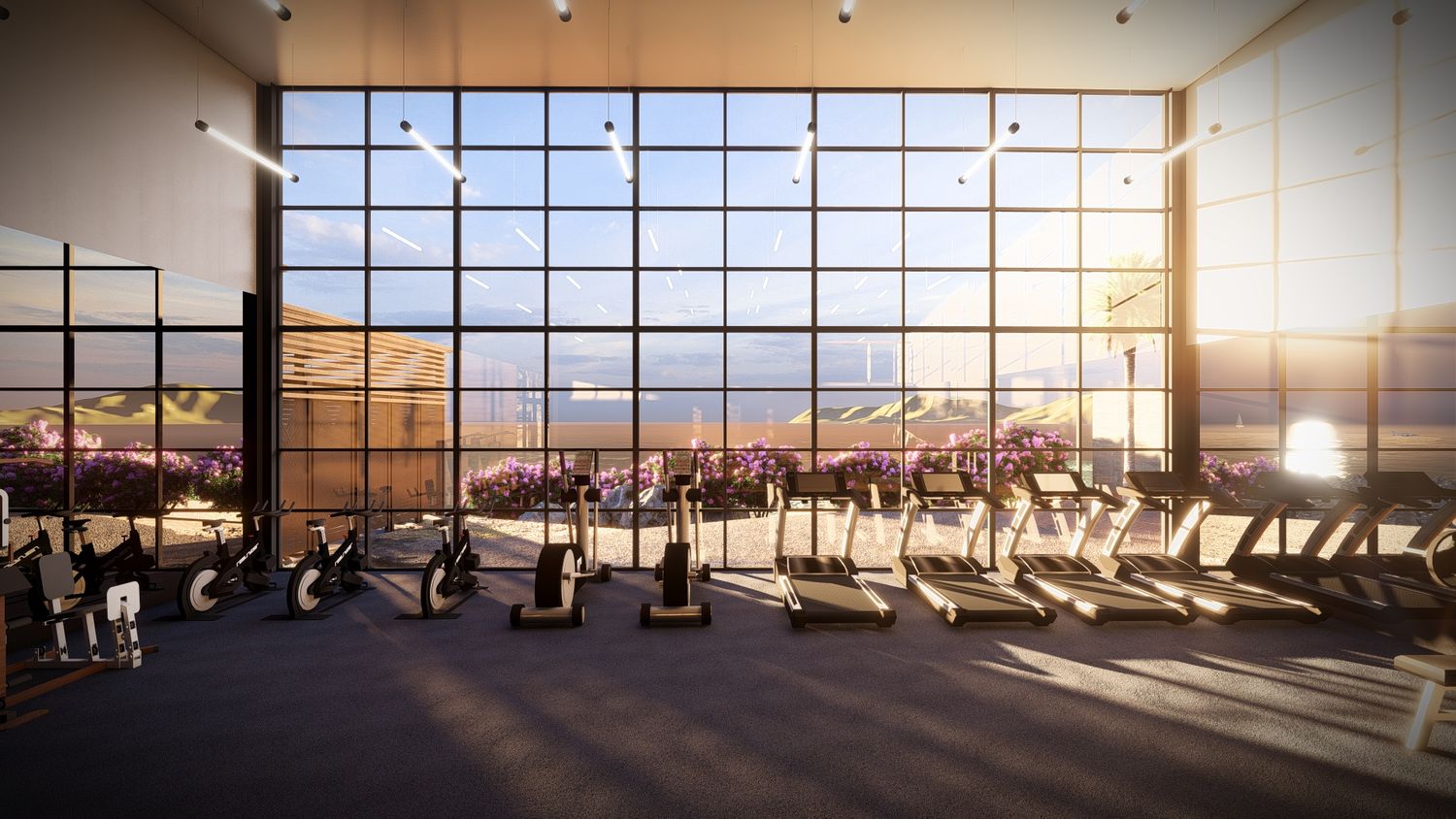 Modern airport terminal waiting area with rows of empty seats and large windows overlooking city skyline at sunset.