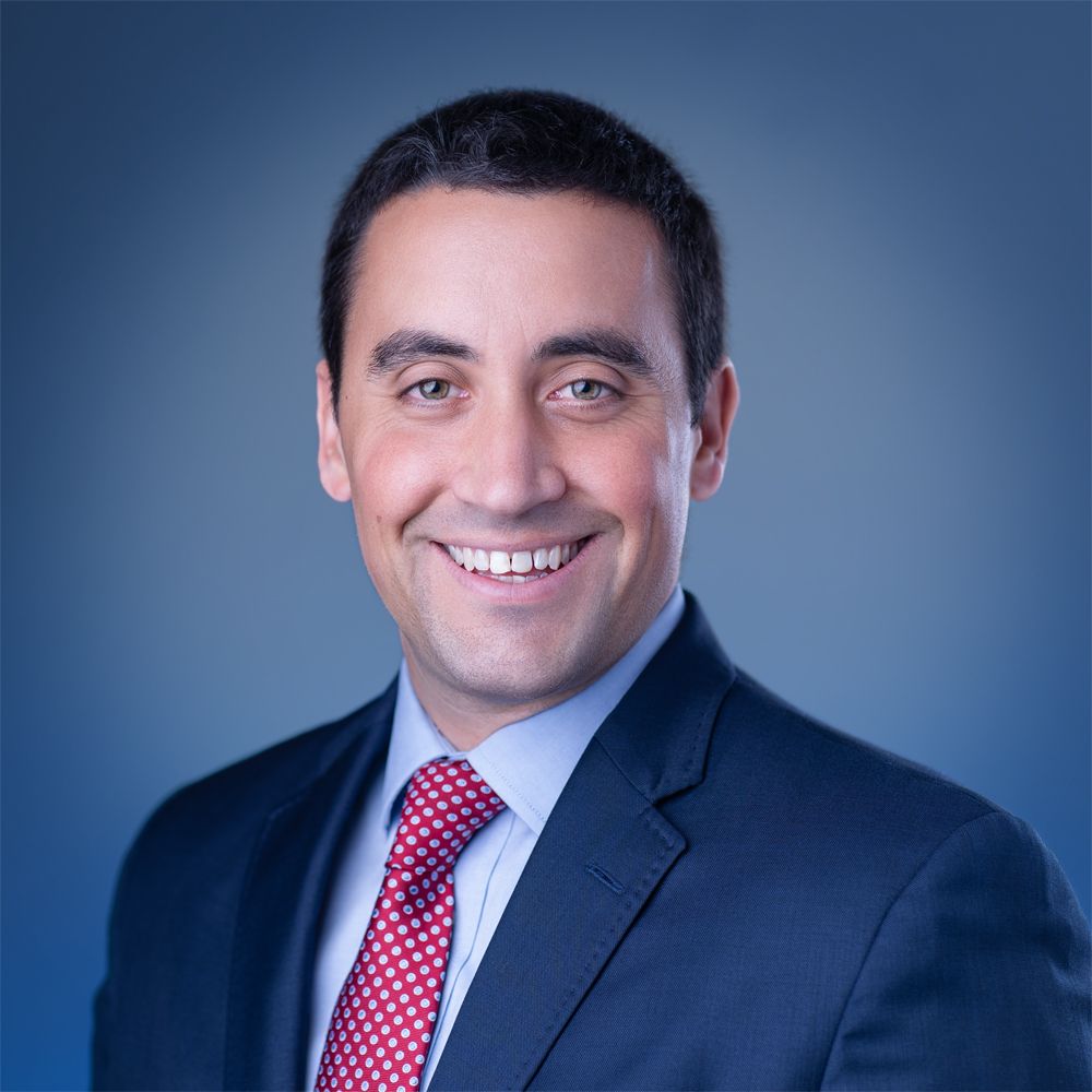 VA Media Group blue background headshot