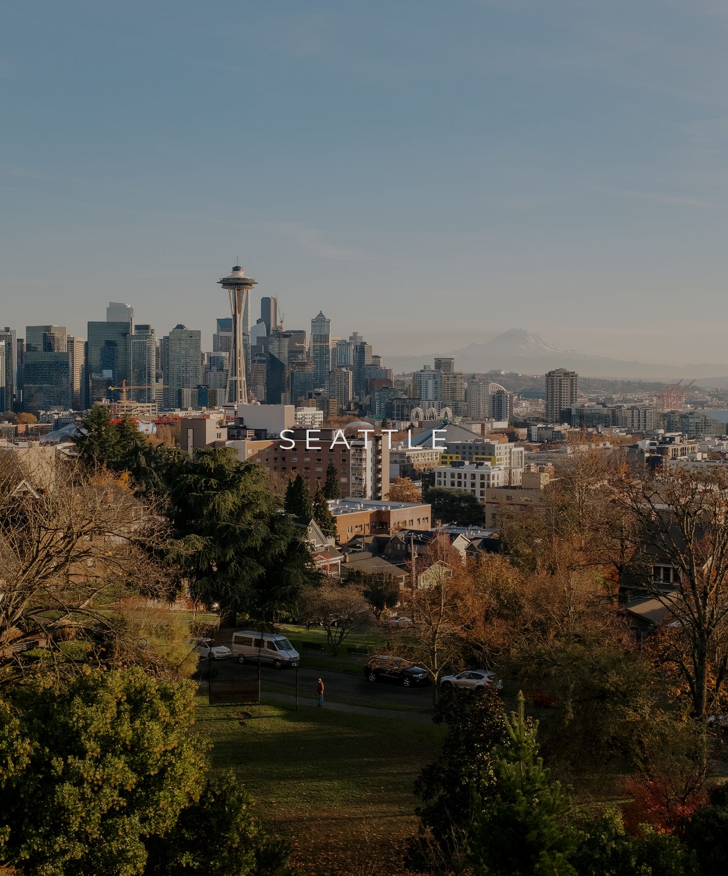 Iconic Seattle skyline with Space Needle and downtown buildings viewed from Kerry Park on a sunny afternoon.