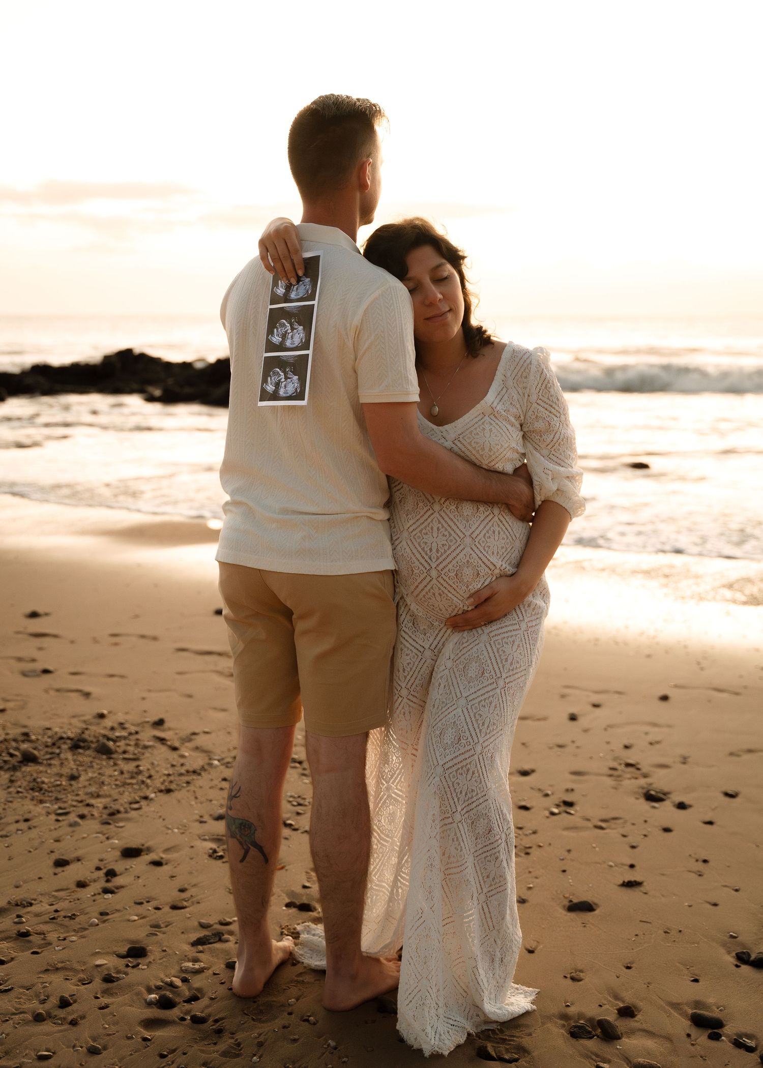 Two people embrace in loving silhouettes walking along a sunset beach in Maui with multiple photo perspectives.