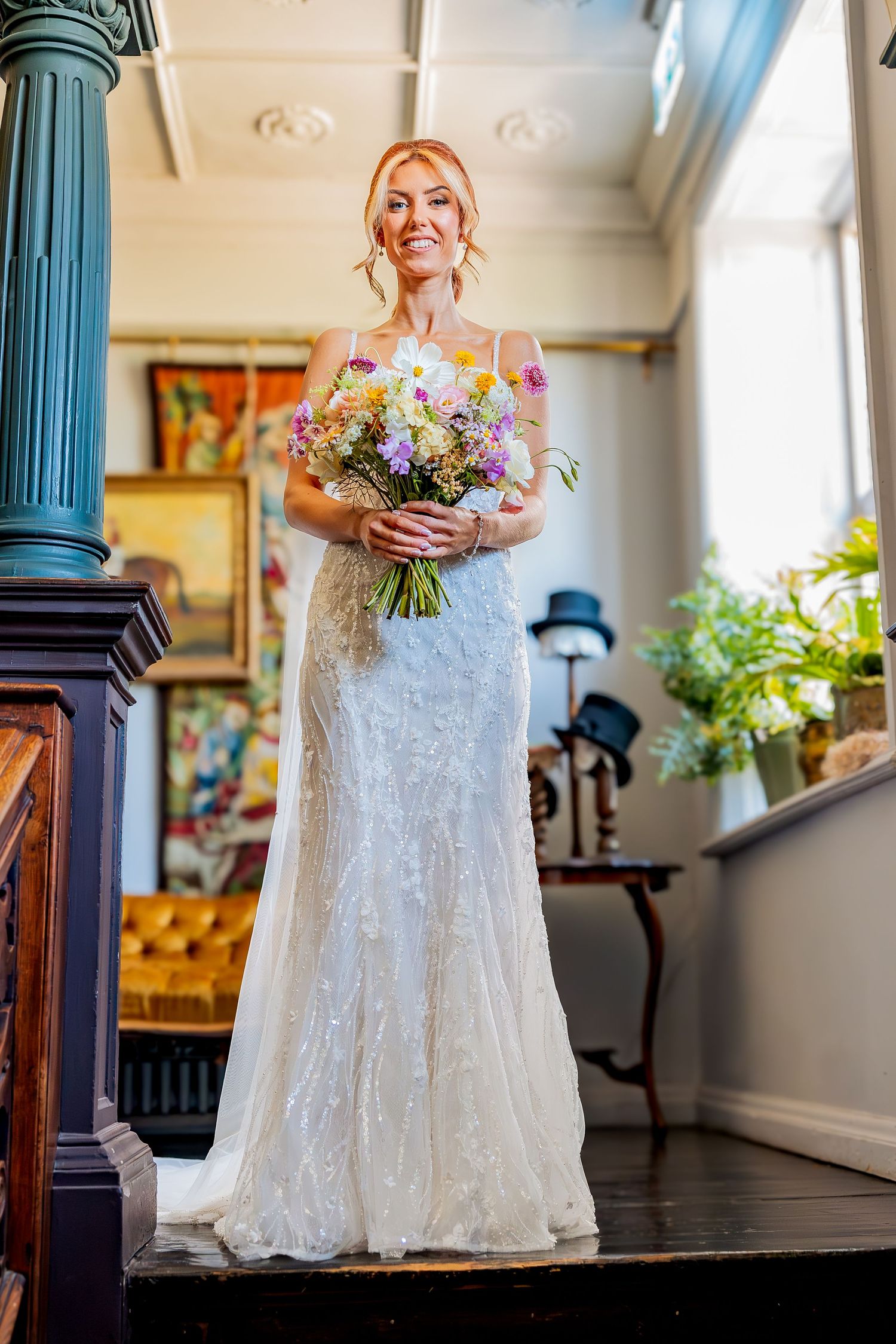 A sequence of elegant wedding photos showing a white lace gown and colorful bouquet in a bright interior setting.