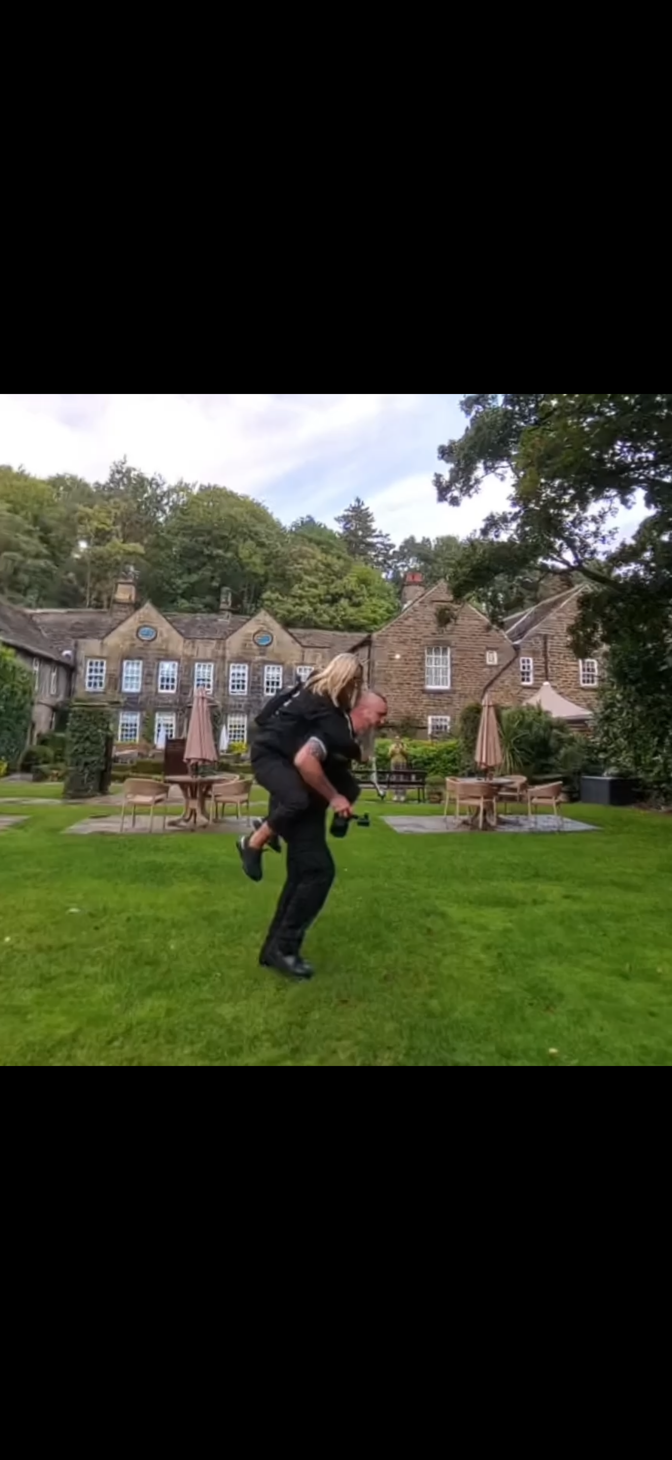 3rdeyeimage couple play about at a wedding.