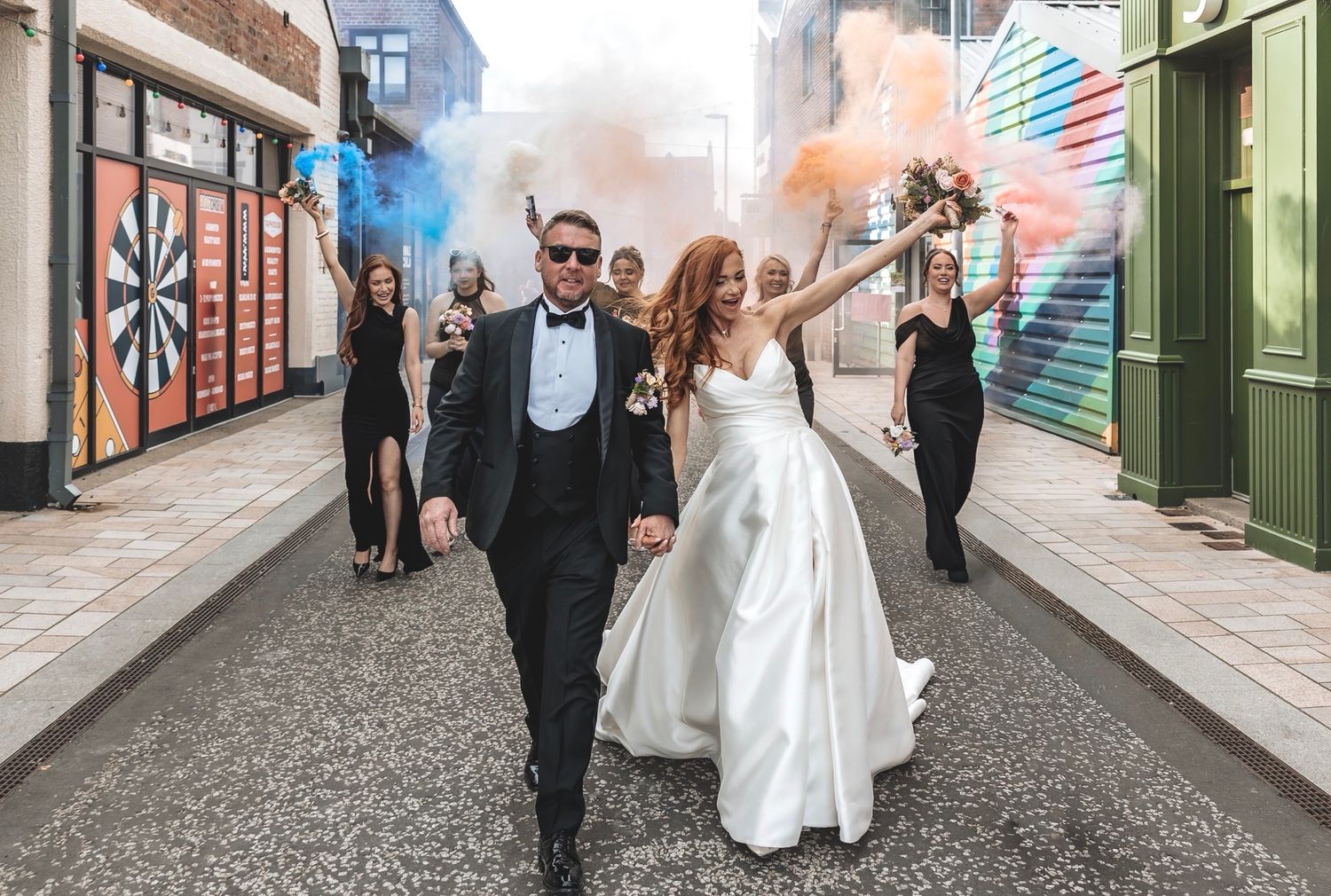 Wedding fun with smoke bombs down a Yorkshire road.