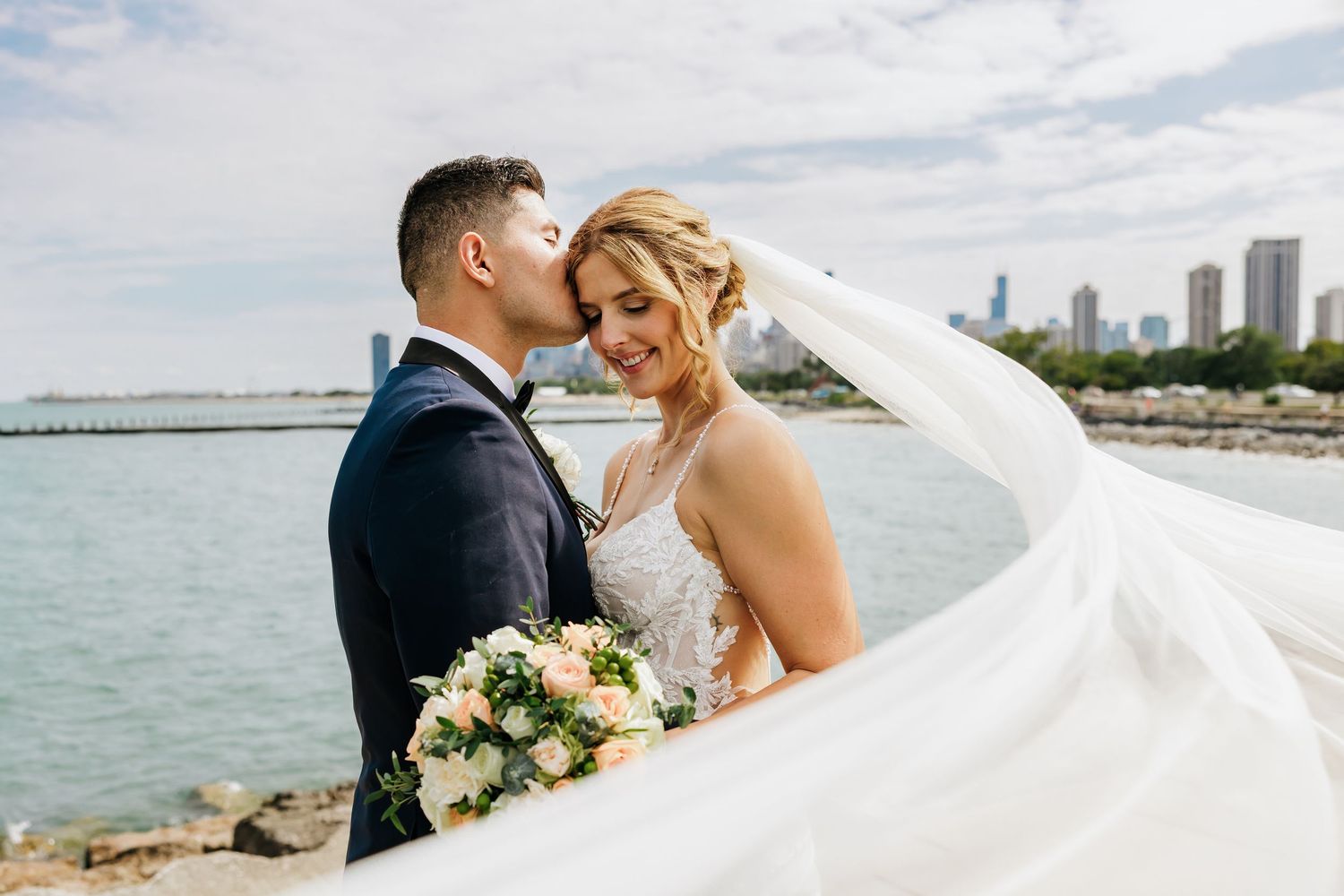 Bride and groom in Chicago, Illinois, veil swoop