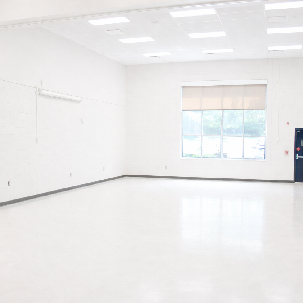 Clean minimalist commercial space with bright lighting and white interior.