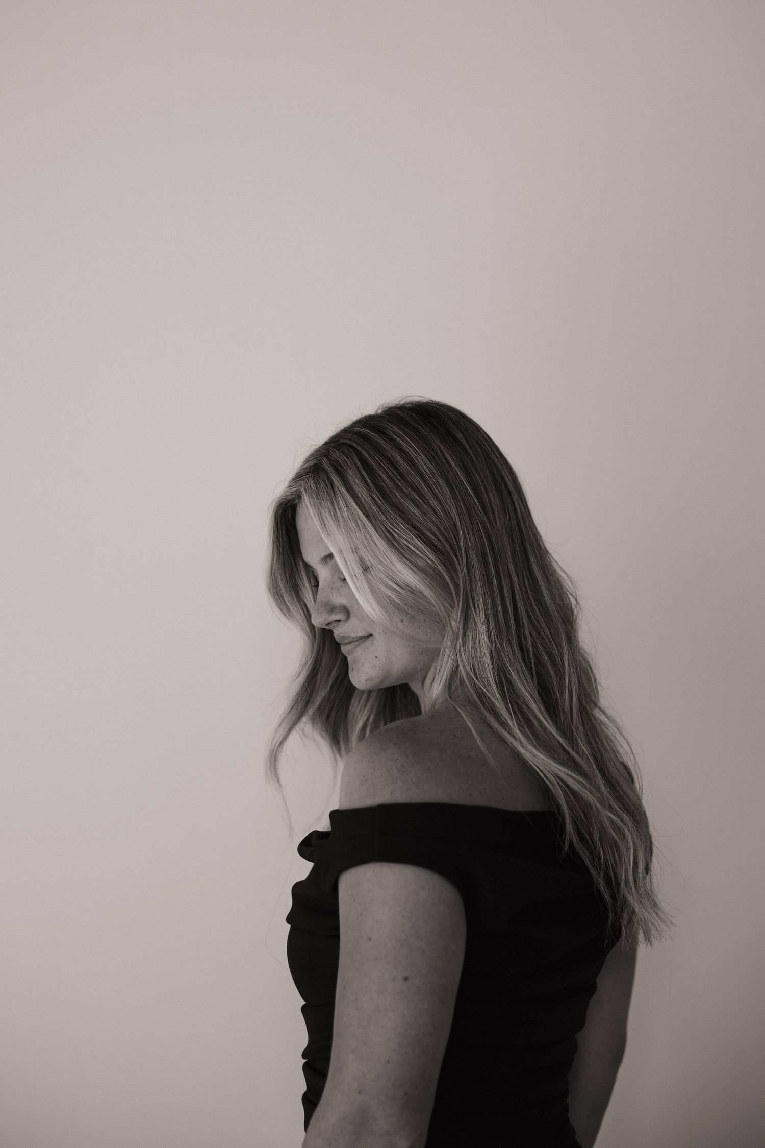 Artistic black and white profile portraits showing movement and emotion.