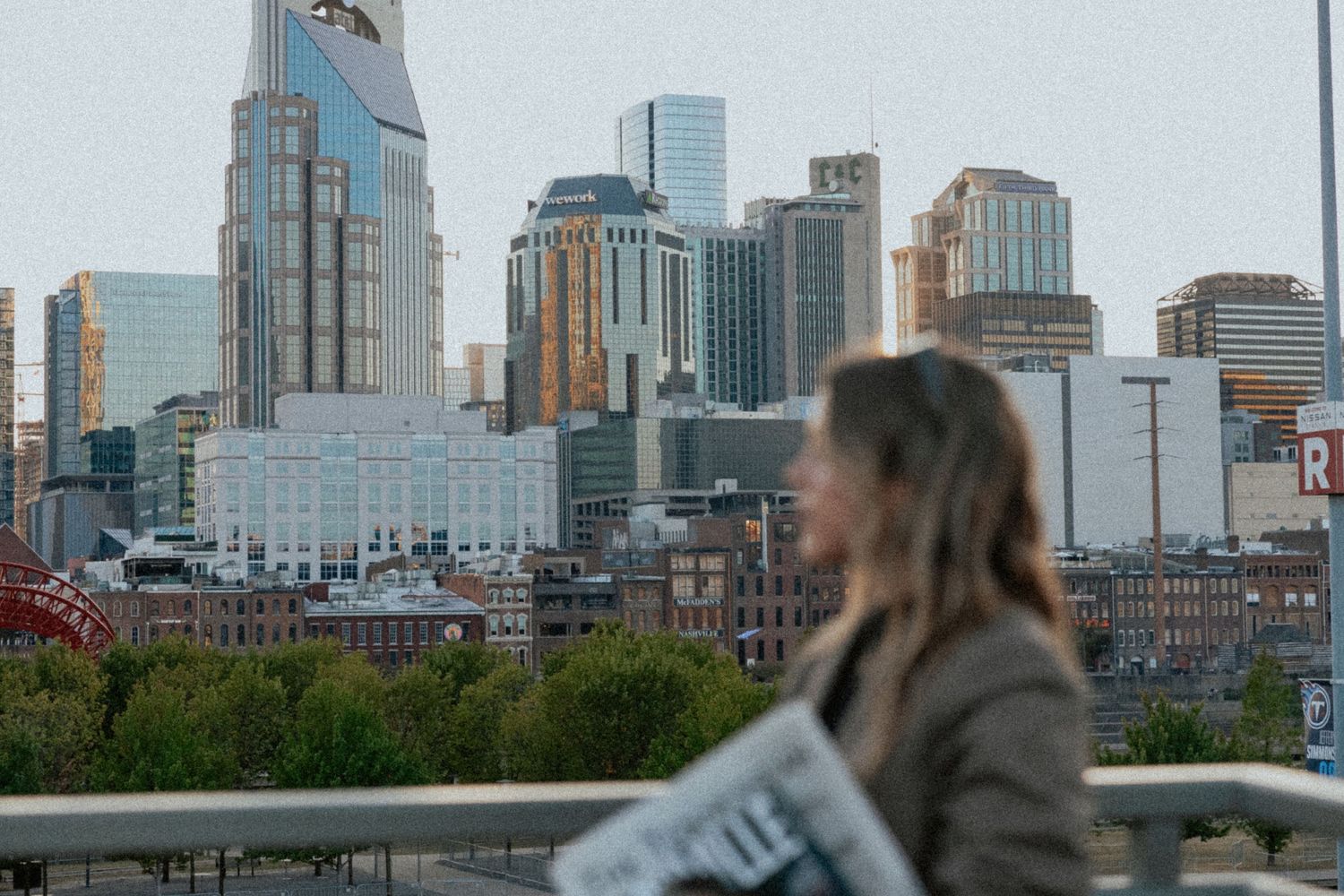View of downtown Minneapolis skyline with modern skyscrapers and office buildings visible in the background.
