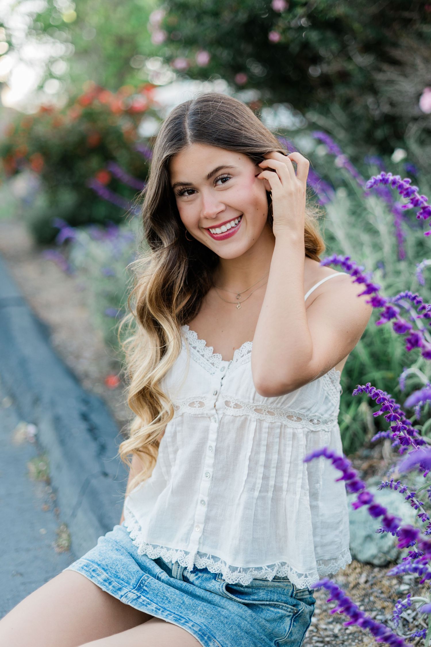 SLO High Senior photos sitting in garden in slo for senior photo session by felisha connolly photography