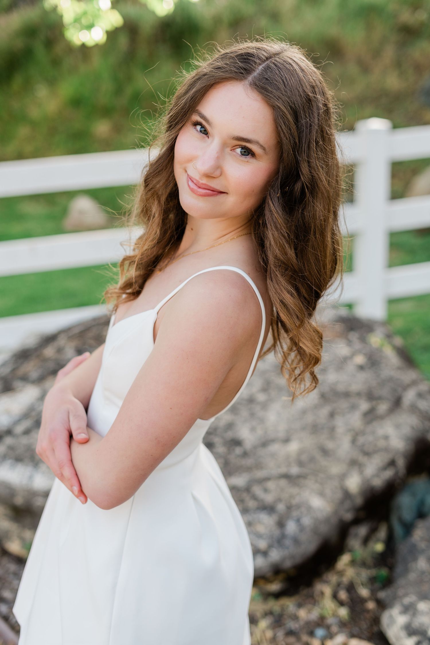 san luis obispo high senior | Madonna Inn garden | Felisha connolly photography | senior girl in white dress | cap & gown | senior session