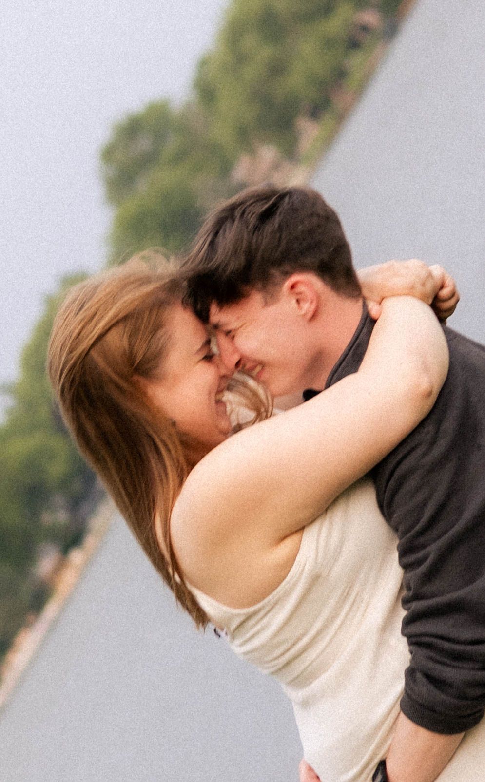 Outdoor summer engagement photos at the lake in Bloomington, Illinois