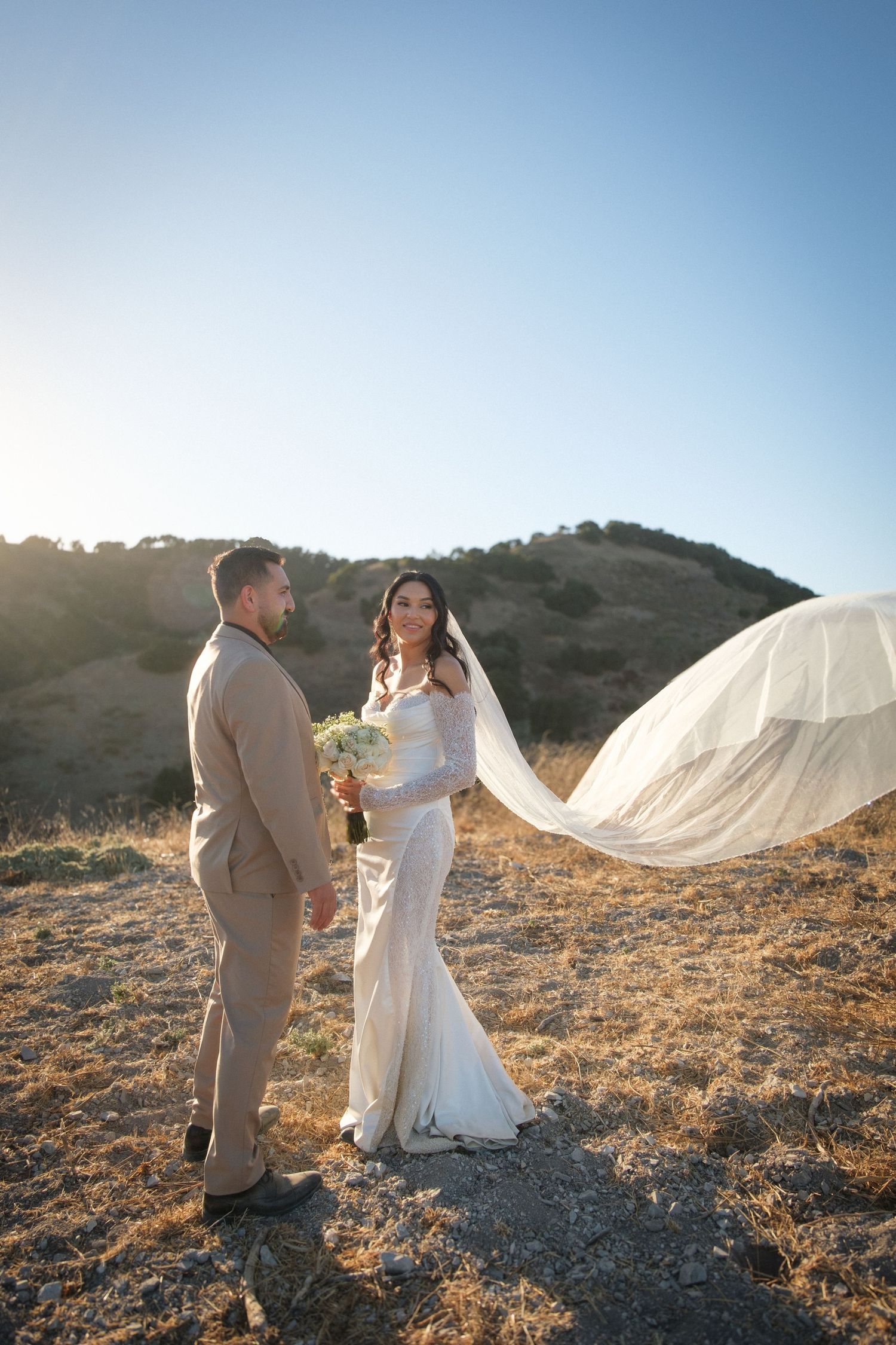 Candid wedding photography of a bride and groom at golden hour in Santa Ynez.