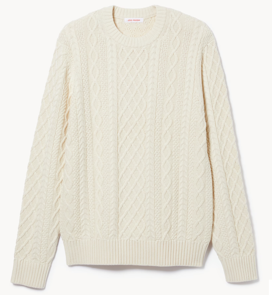Cream colored cable knit cropped sweater shown from three different angles on a white background.