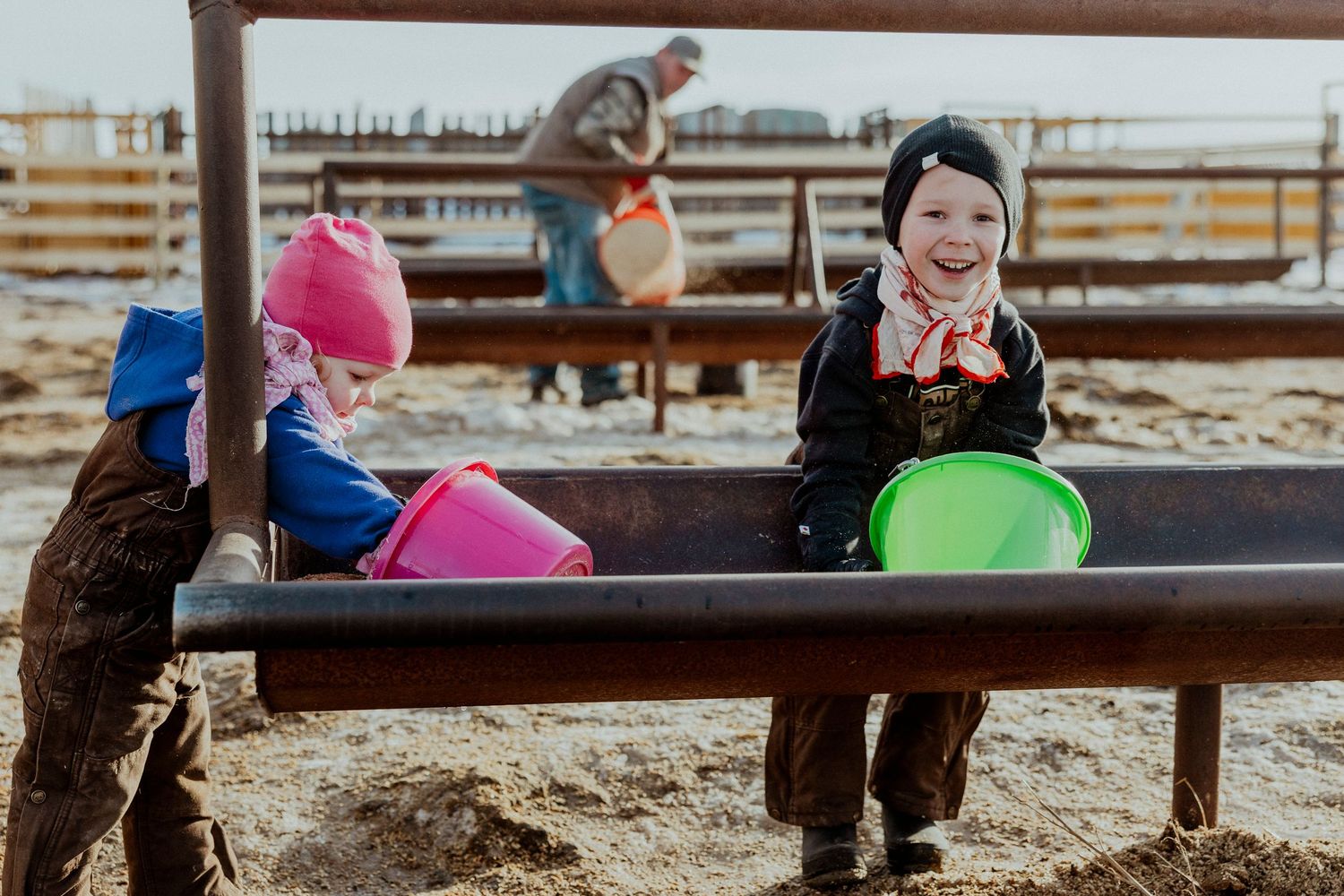 lifestyle session, candid photos,Saskatchewan farm kid, prairie photographer, sask photographer, winter photos, cattle family, chores, ag