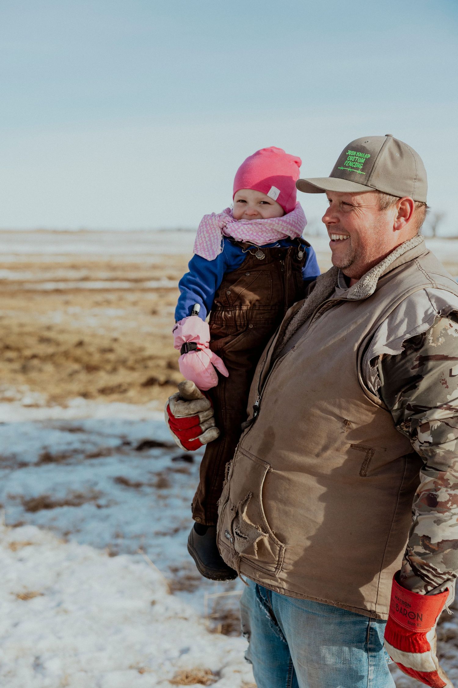 lifestyle session, candid photos,Saskatchewan farm kid, prairie photographer, sask photographer, winter photos, cattle family, chores, ag