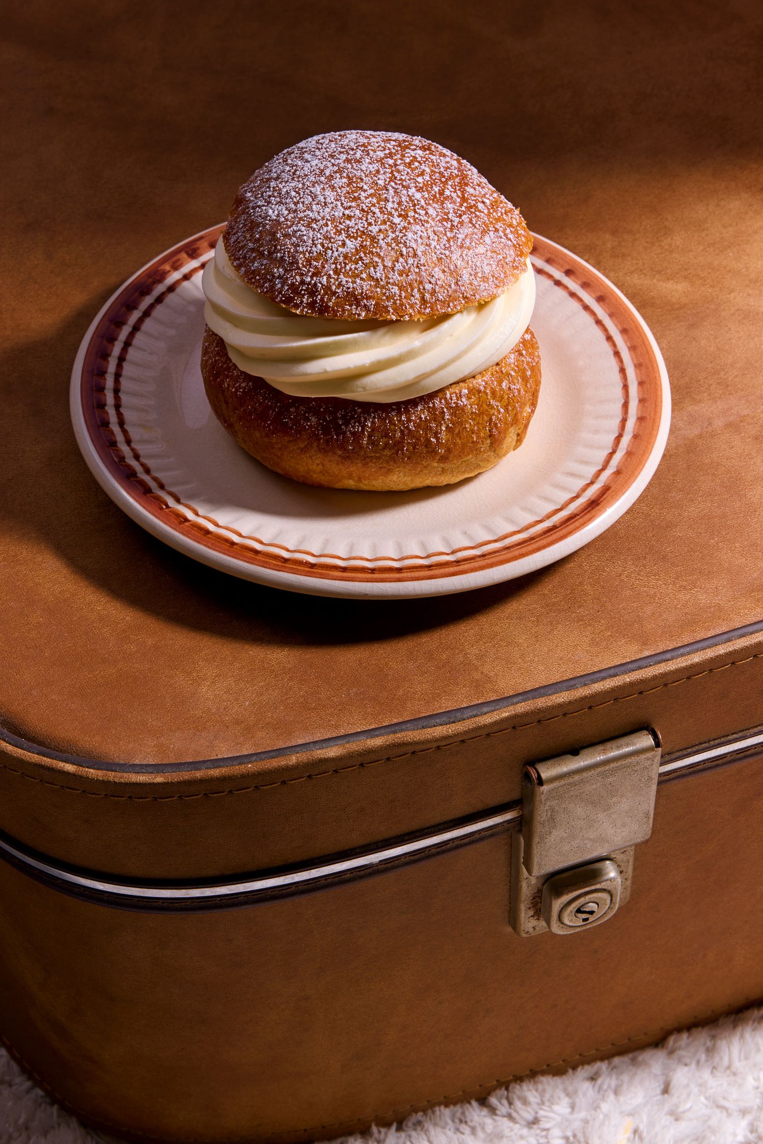 Creative food image featuring a Nordic bun with bold lighting, photographed by a commercial product photographer in London