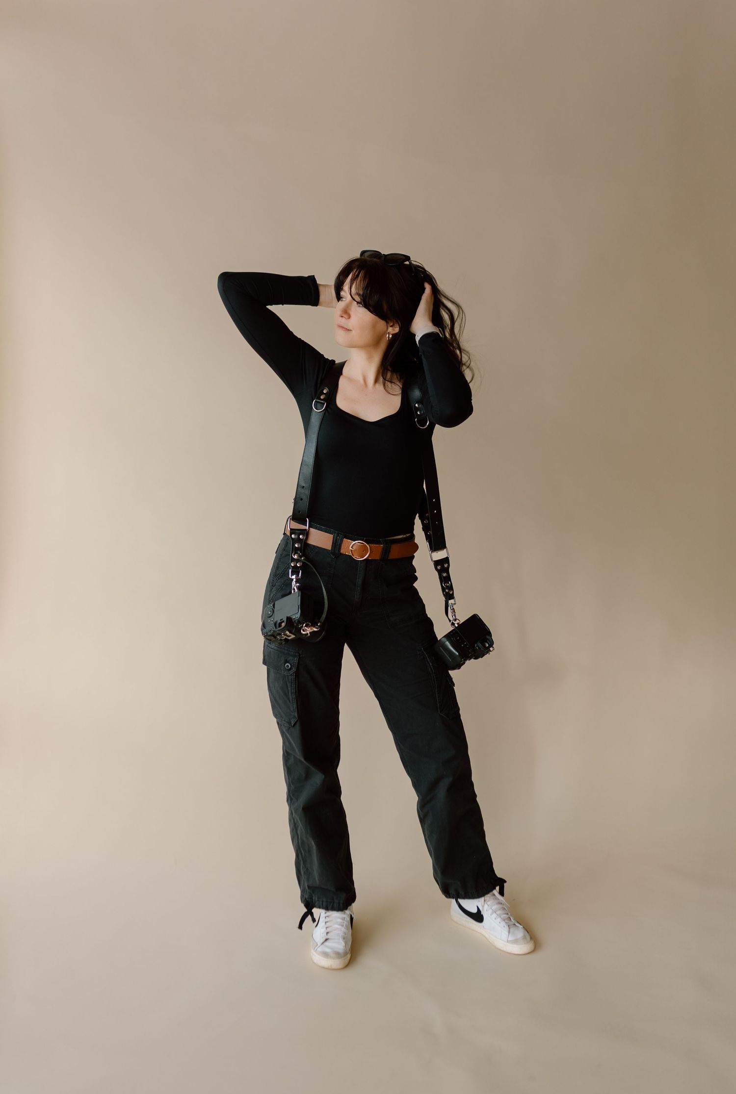 Kayla Ann Photography, a West Michigan wedding photographer based in Grand Rapids, captured in her element with cameras in hand.