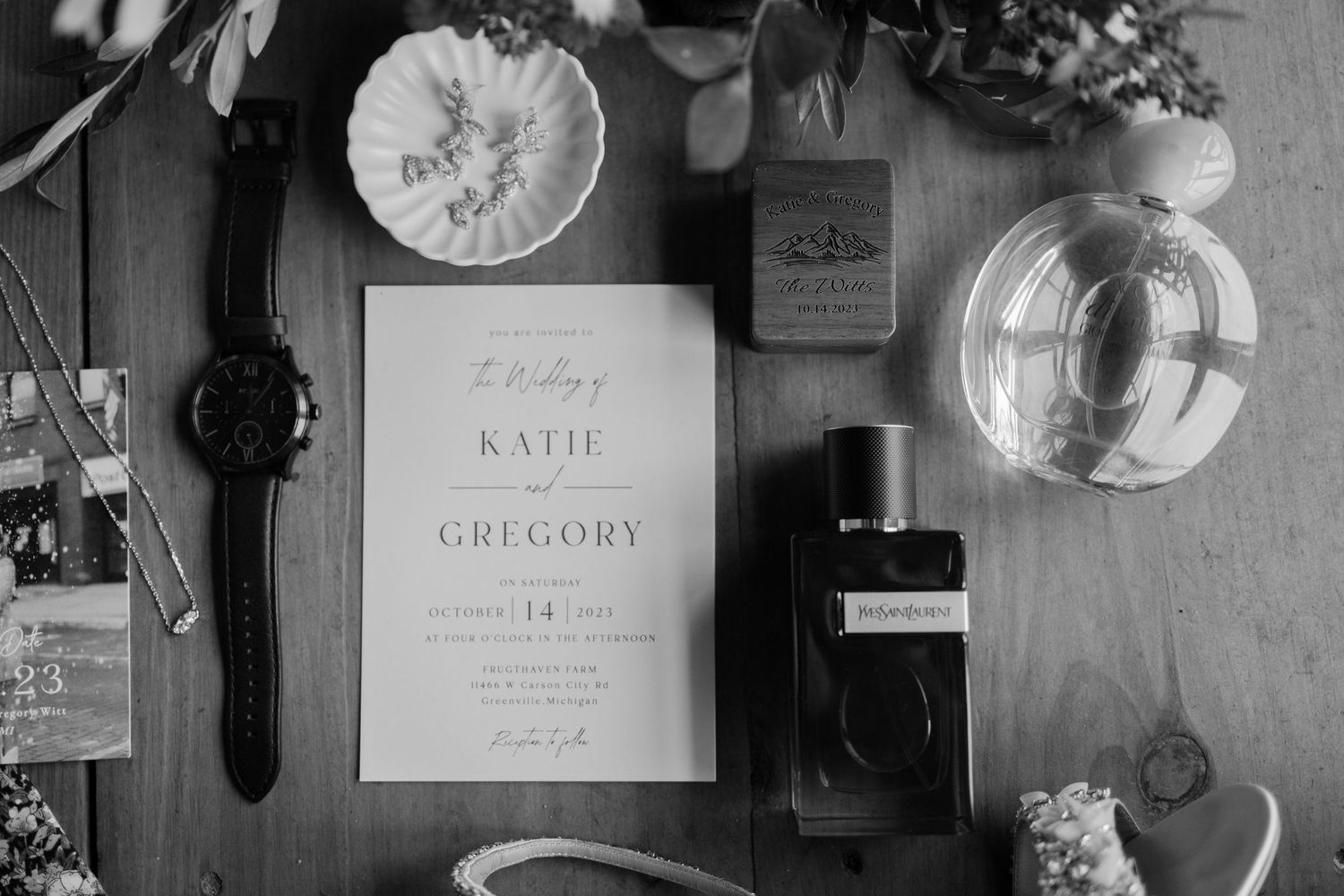 Flat lay of wedding details featuring rings, invites, shoes & florals. Kayla Ann Photography Grand Rapids Michigan Wedding Photographer.