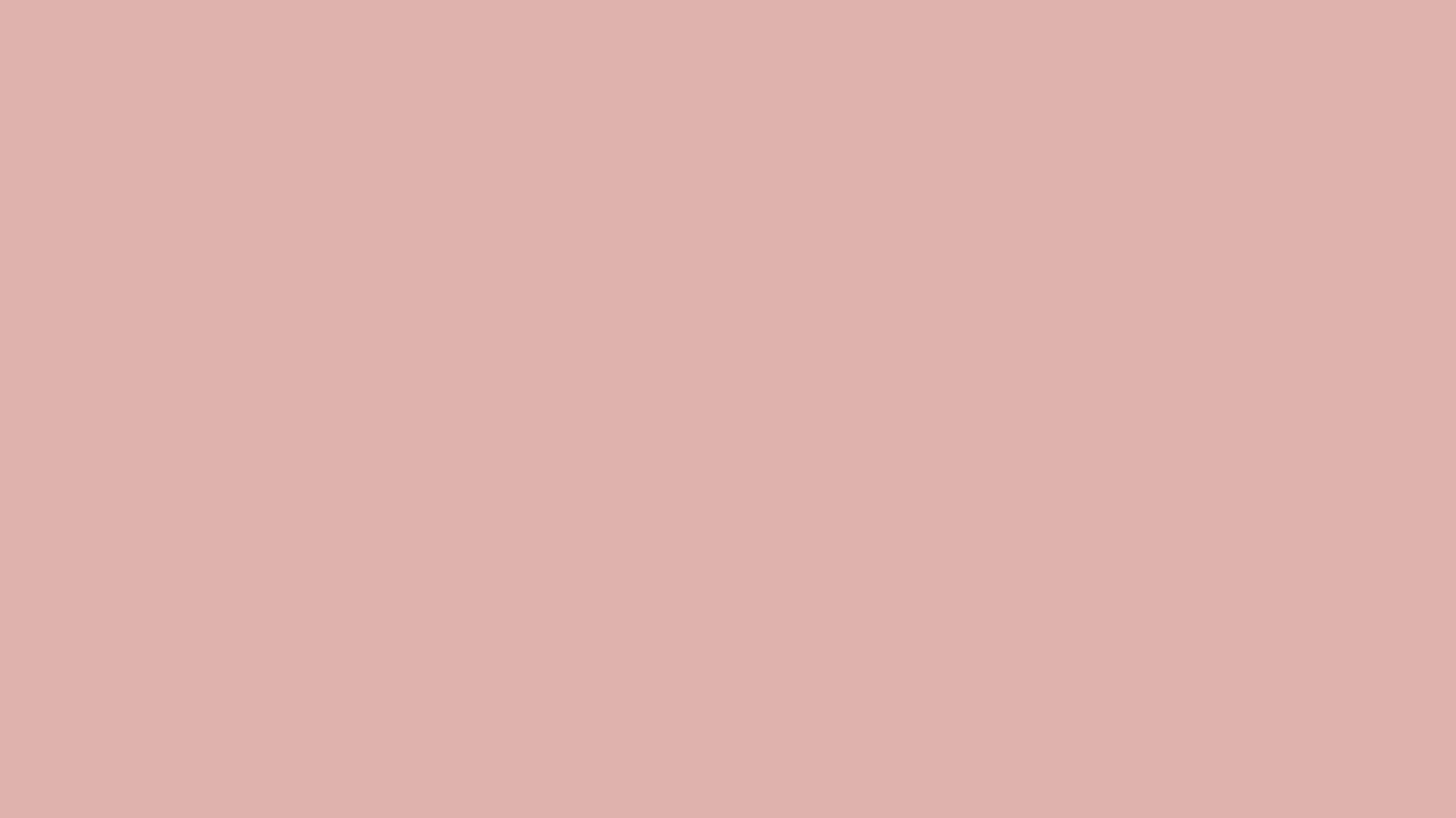 Soft blush pink solid color background with a smooth matte finish in a warm rose tone.