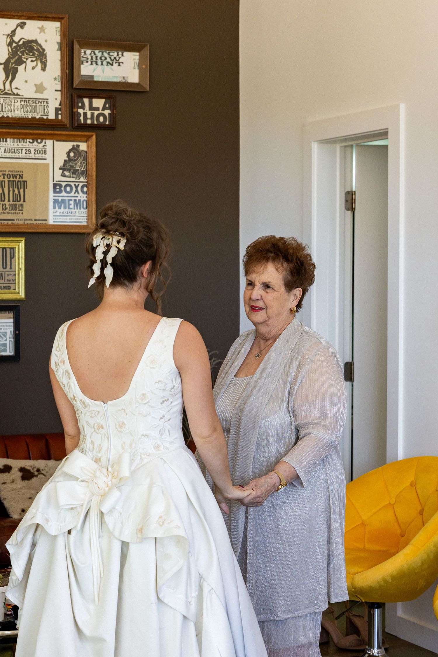 bride and mom share an intimate moment during the getting ready portion of the day