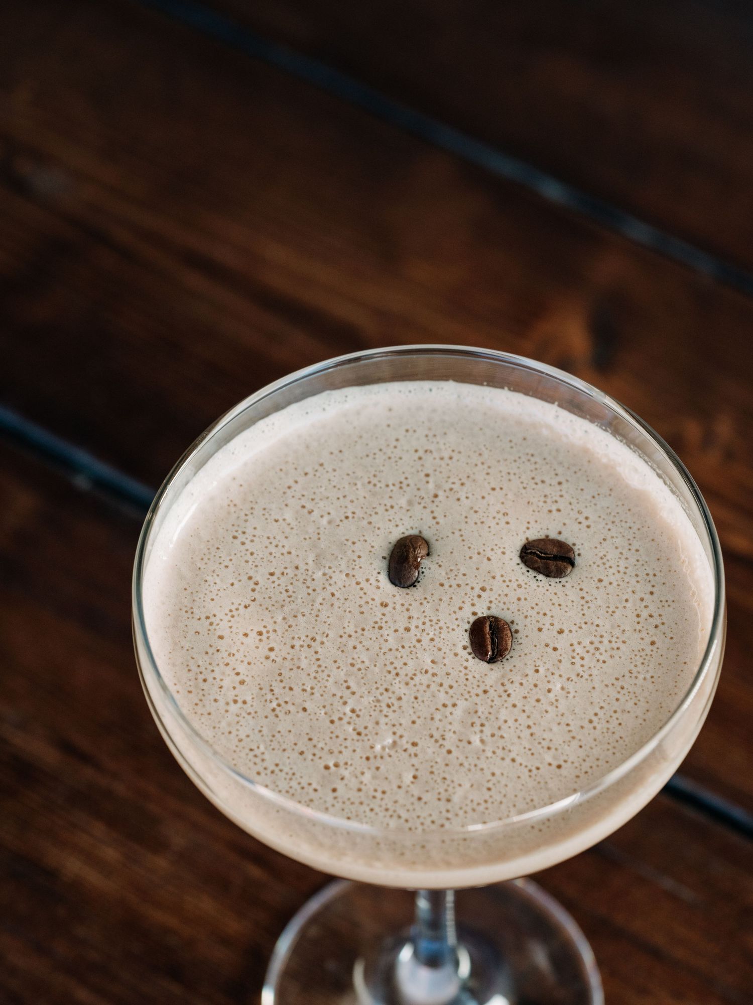 Close-up of a creamy espresso martini, captured in natural light by BC food photographer James Fujita.