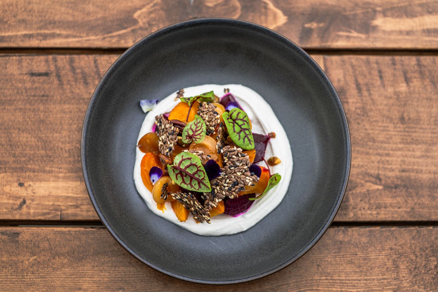 Plated beet and squash salad on rustic wooden table — food photography by James Fujita in Kelowna, Okanagan Valley