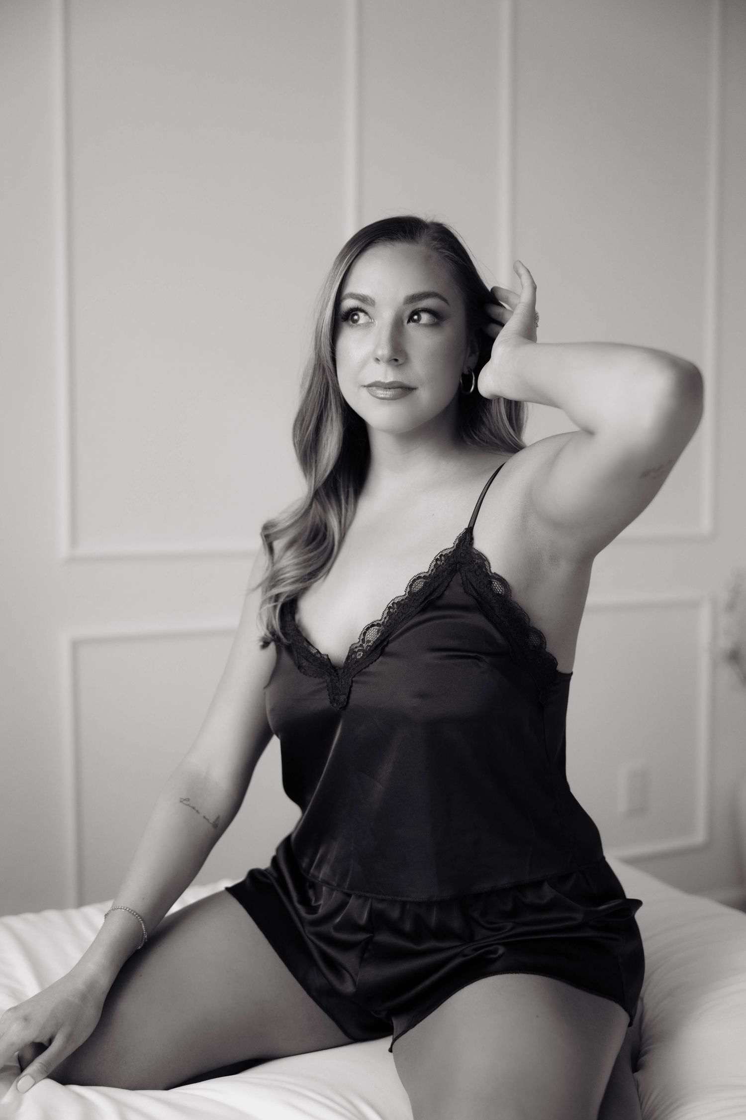 Artistic shadows in luxury black boudoir setup