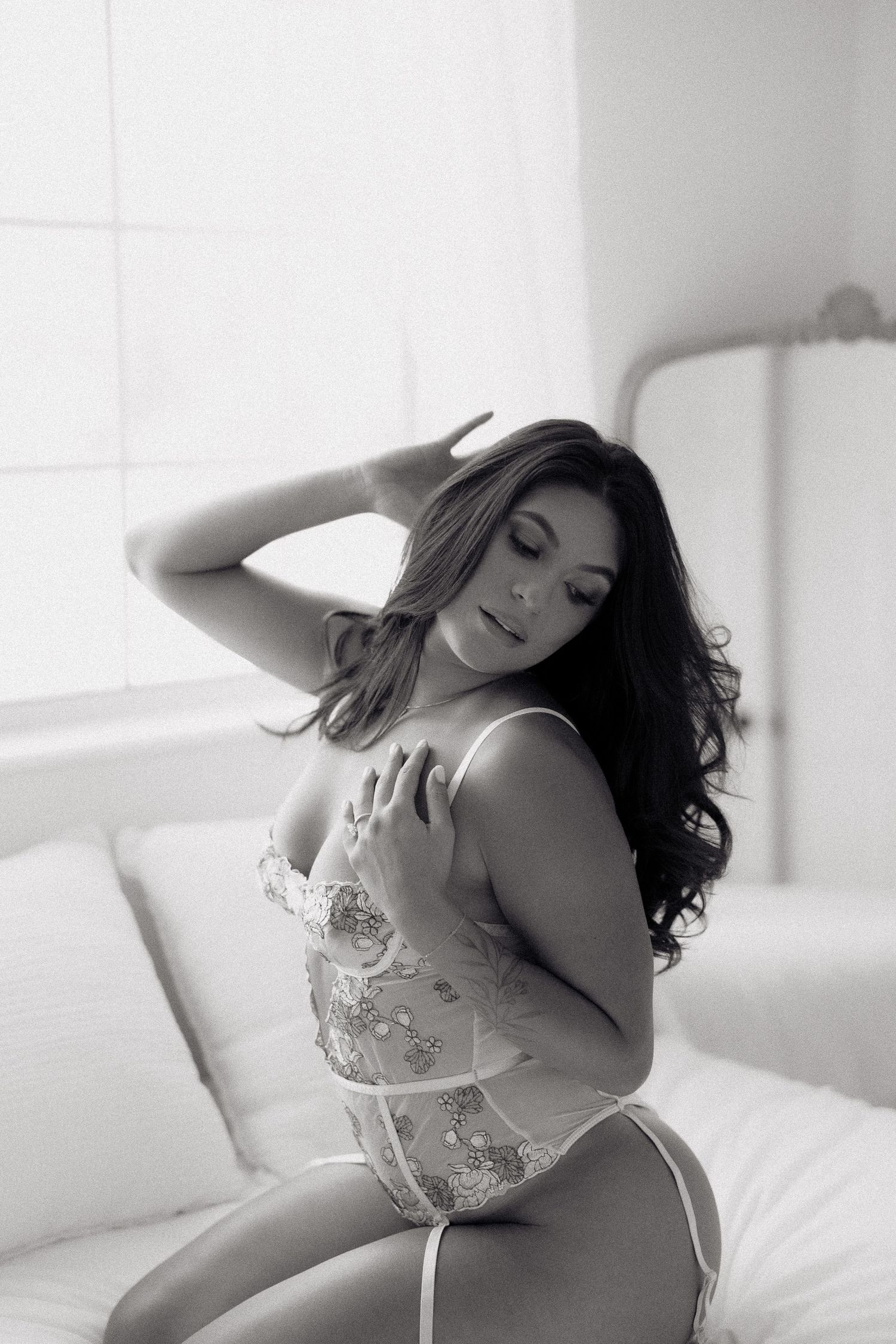 Elegant boudoir photo session with soft natural lighting