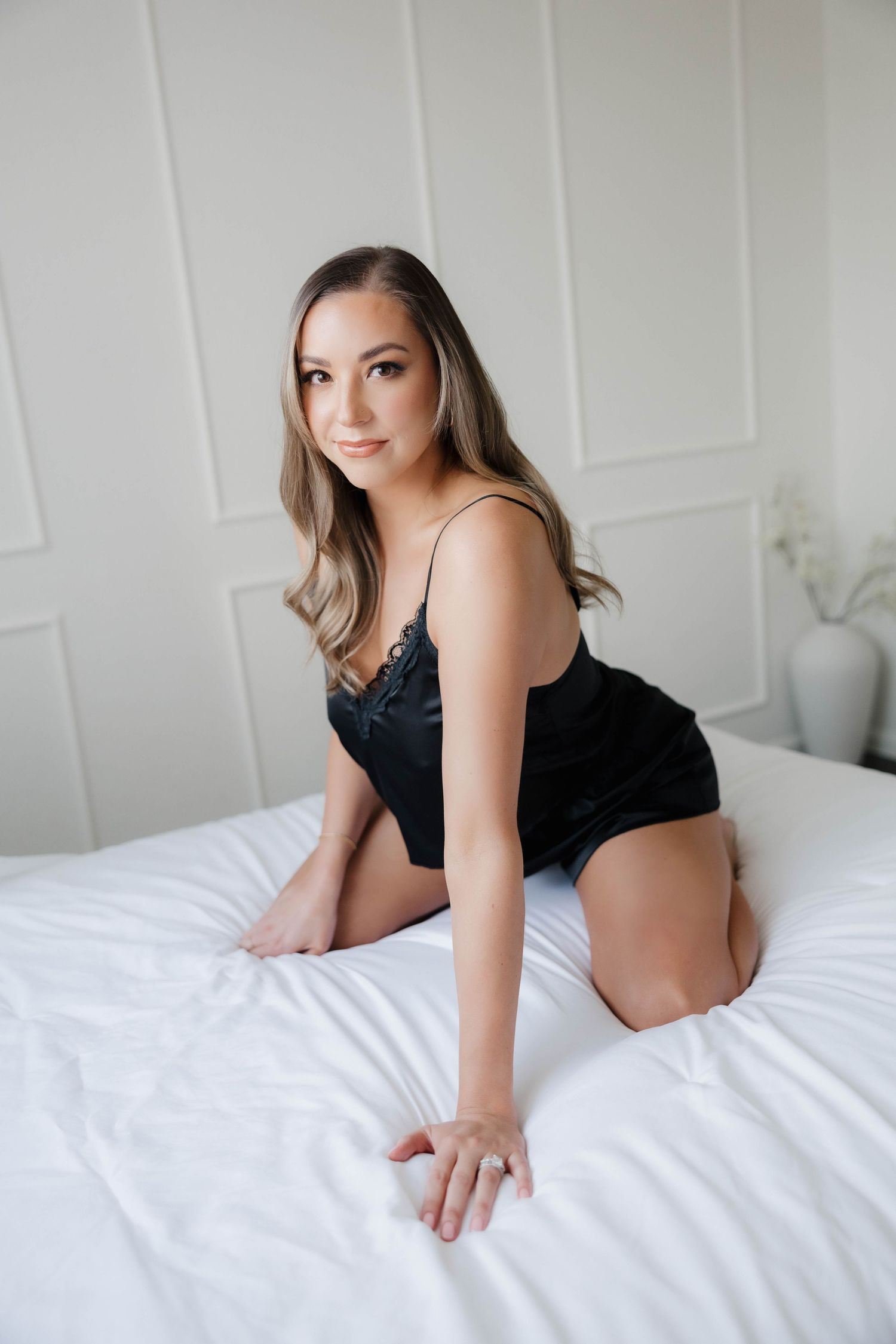 Bold boudoir portrait in black lace set