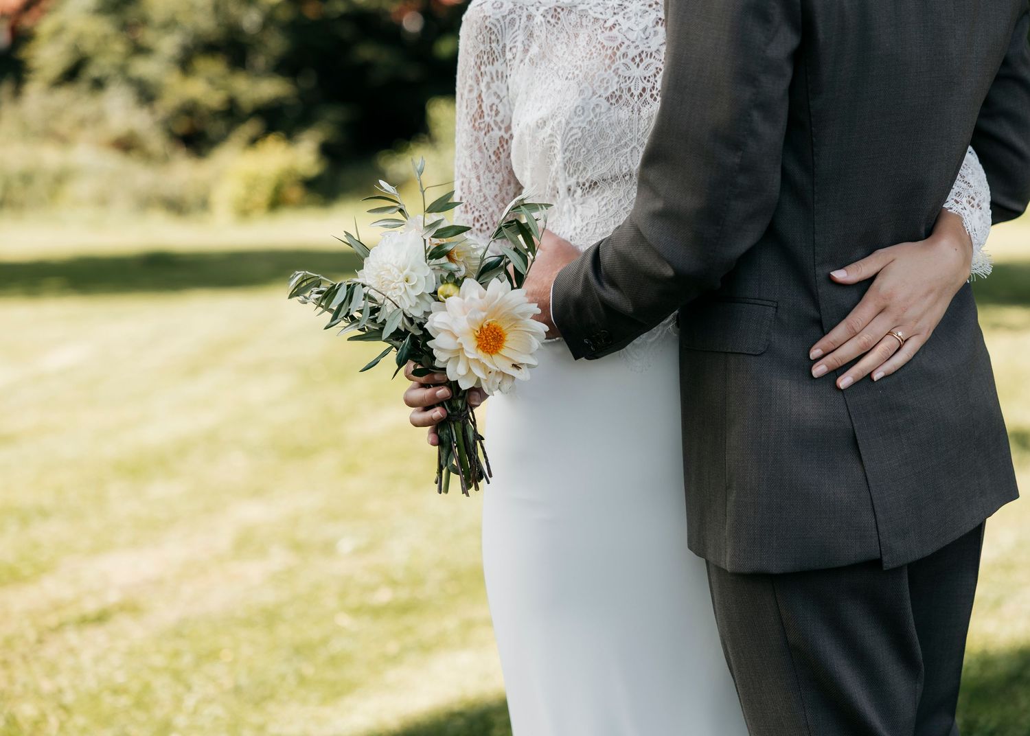 Wedding couple shares tender moments during their outdoor photo session.