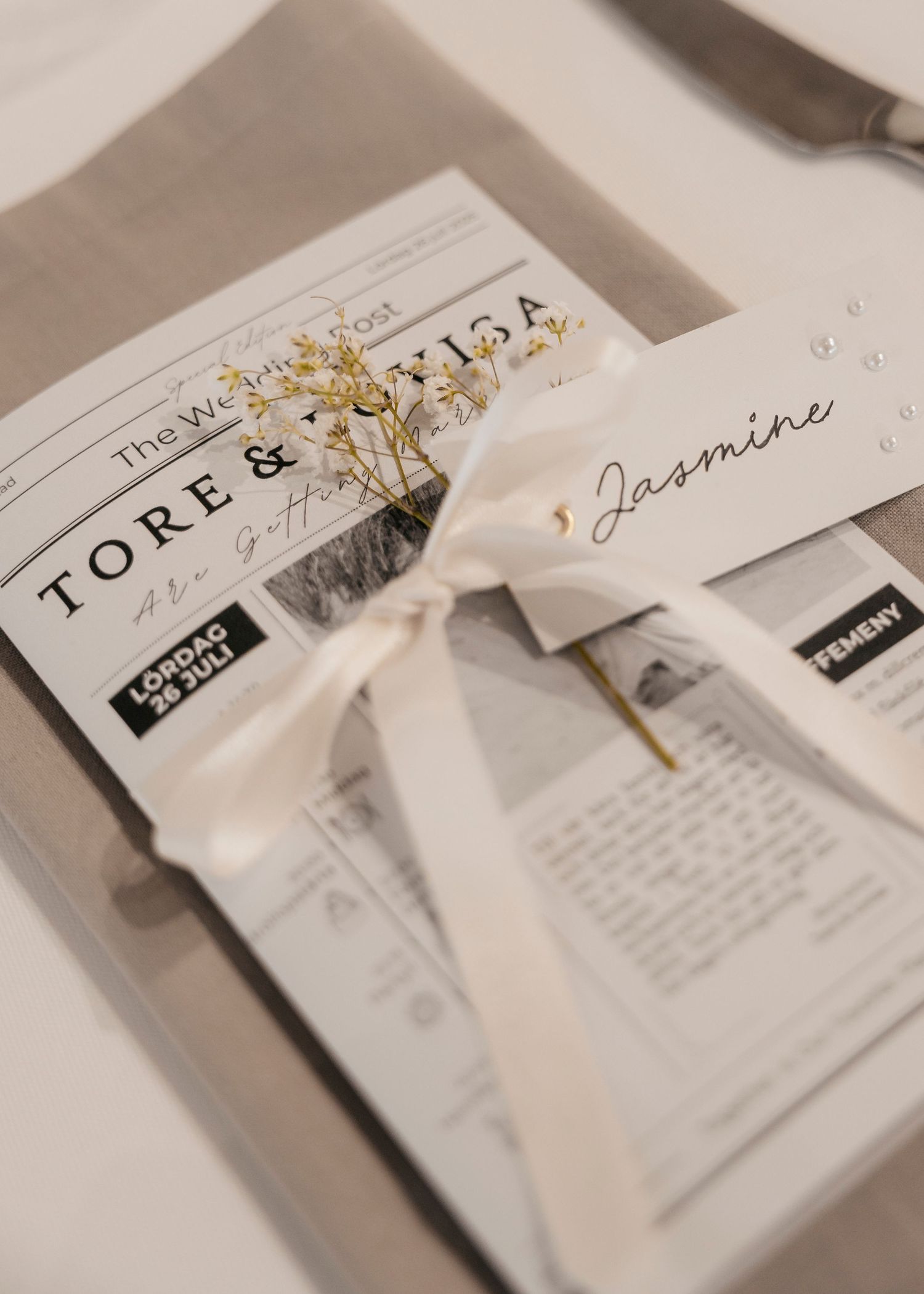Wedding invitation suite with elegant typography and gold accents.