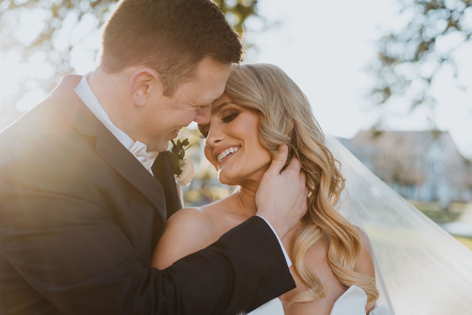 Romantic golden hour portrait session in a natural outdoor setting.