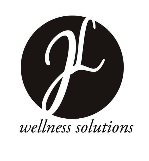 Black and white logo design showing stylized letter shapes and text reading 'wellness solutions'.