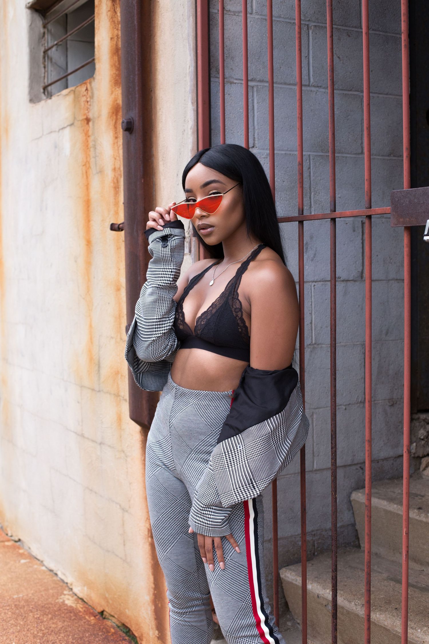 Lifestyle photography featuring casual athleisure wear and a cup of coffee.