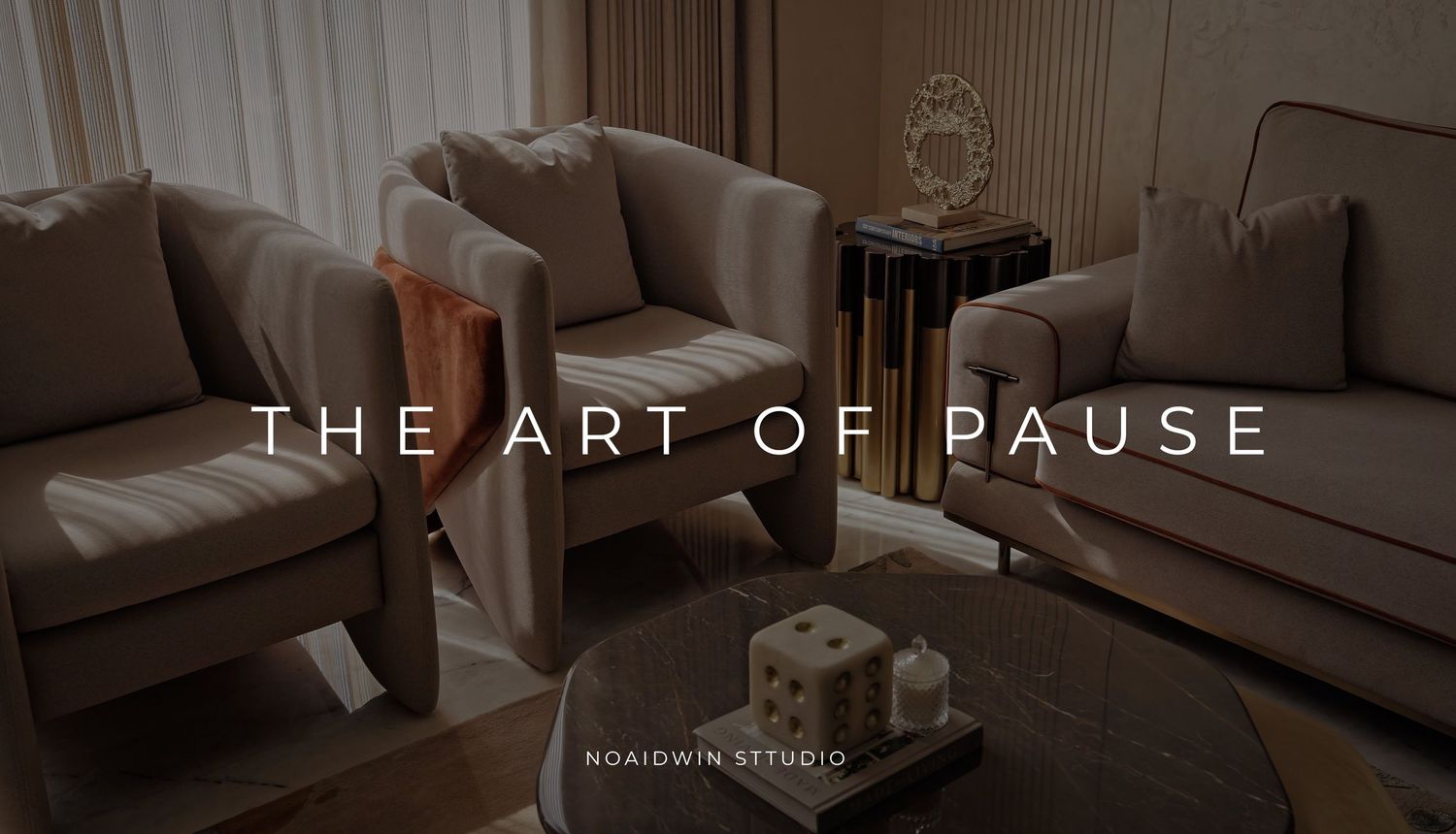 Elegant living room with neutral-toned armchairs and sofa, featuring the text The Art of Pause by Noaidwin Studio.