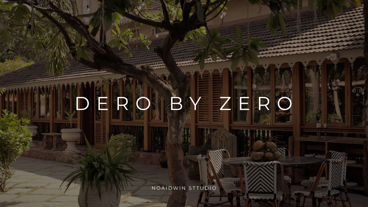 Dero By Zero restaurant exterior featuring wooden architecture, outdoor seating, and lush trees, designed by Roadwin Studio.